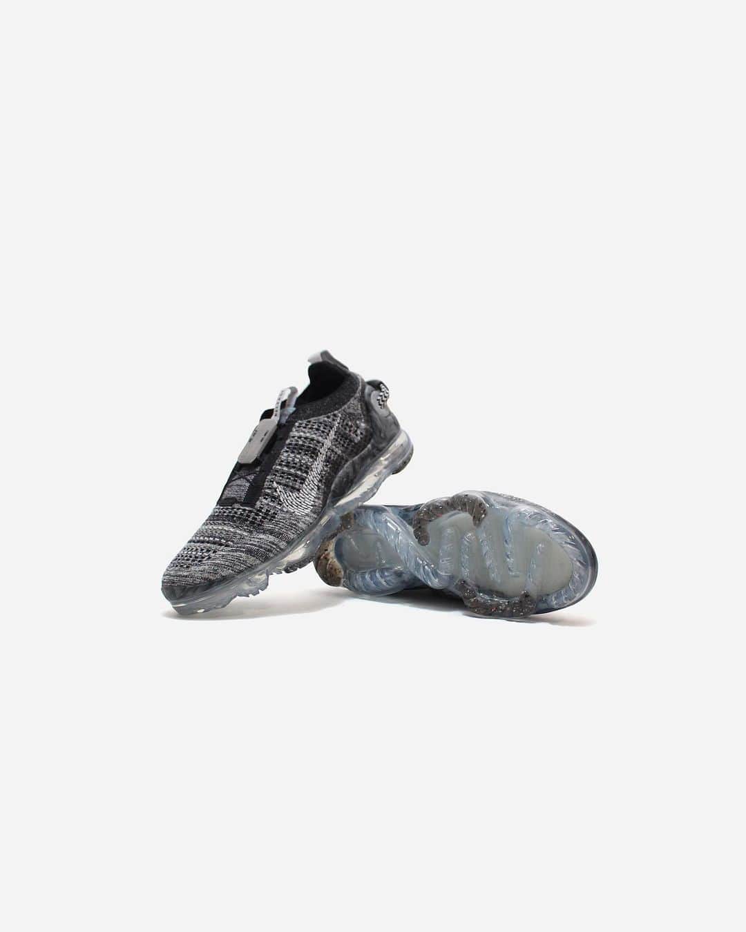 A+Sのインスタグラム：「2020. 11. 5 (thu) in store﻿ ﻿ ■NIKE AIR VAPORMAX 2020 FLYKNIT﻿ COLOR : BLACK/WHITE-BLACK﻿ SIZE : 26.0cm - 29.0cm﻿ PRICE : ¥23,000 (+TAX)﻿ ﻿ ナイキ エア ヴェイパーマックス 2020 フライニットの特長は、その画期的な履きやすさだけではない。このデザインは、より持続可能な未来に向けた次の一歩を象徴している。シューズには廃棄物を再利用する製法と素材を使用。アウトソールにはNike Grind、アッパーにはリサイクルポリエステルの糸を使うなど、シューズの50％以上（重量換算）にリサイクル素材が使用されている。﻿ ﻿ The Nike Air VaporMax 2020 Flyknit isn't just about its groundbreaking ease of wearing. This design symbolizes the next step towards a more sustainable future. The shoes use a manufacturing method and materials that reuse waste. Recycled materials are used in more than 50% (weight equivalent) of shoes, such as Nike Grind for the outsole and recycled polyester thread for the upper.﻿ ﻿ #a_and_s﻿ #NIKE﻿ #NIKEAIRVAPORMAX﻿ #NIKEAIRVAPORMAXFLYKNIT﻿ #NIKEAIRVAPORMAXFLYKNIT2020」