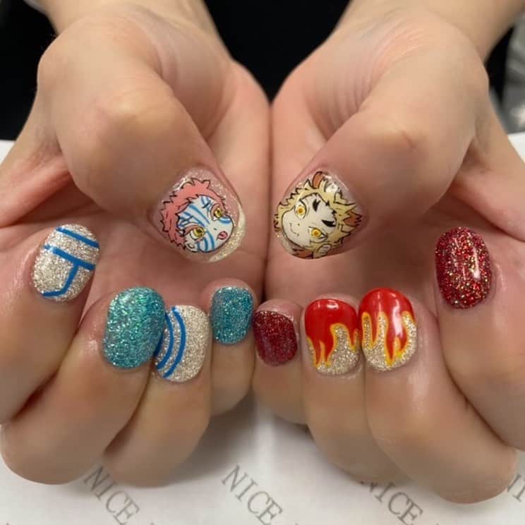 小嶋晶子のインスタグラム：「(◎´艸`{ New nail💅I really like like this!! #nail #nails #newnail #newnails #ジェルネイル #手描きネイル #痛ネイル #鬼滅の刃ネイル #鬼滅ネイル #煉獄杏寿郎 #炎柱 #煉獄ネイル #猗窩座 #上弦の参 #猗窩座ネイル ##🔥⚔👹」