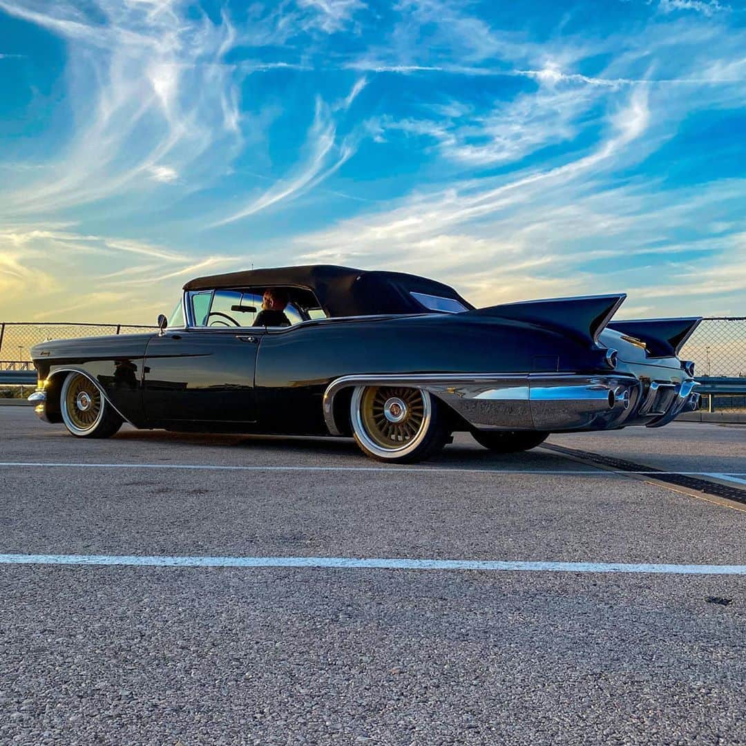 Classics Dailyさんのインスタグラム写真 - (Classics DailyInstagram)「We caught the @chratexas ‘57 Cadillac Biarritz Vert soaking up the sunset at the @optimabatteries Hi Performance Expo.  Wow, Just Wow! _ 📸 @Ken _ #cadillac #cadilaceldorado #eldorado #lowlife #slammed #americanmuscle #classiccar #kustomcarculture #optimabatteries #hiperformanceexpo」11月2日 22時41分 - classicsdaily