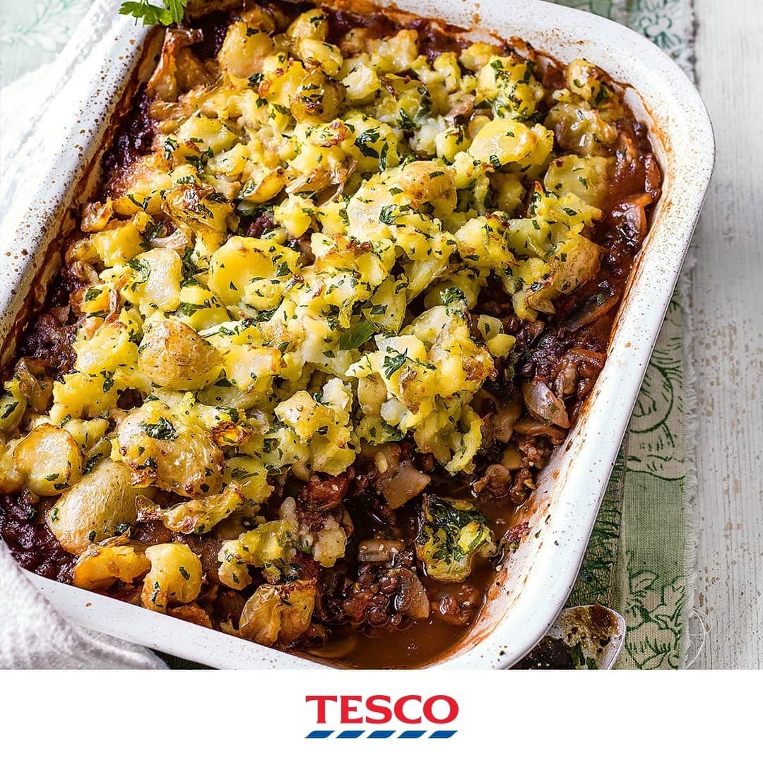 Tesco Food Officialさんのインスタグラム写真 - (Tesco Food OfficialInstagram)「Crunchy on the top, comforting on the inside - look out for this #vegan shepherd’s pie.   #WorldVeganMonth  Ingredients  500g miniature potatoes ½ x 30g pack flat leaf parsley, finely chopped 3 tbsp olive oil 1 onion, finely chopped 1 x 625g family pack mushrooms (closed cup) 2 garlic cloves, finely chopped ¼ tsp crushed chillies 250g ready-to-eat puy lentils 400g tin chopped tomatoes 2 tbsp tomato purée  Method  1. Cook the potatoes in a pan of boiling water for 12-15 mins or until tender. Drain and return to the pan. Season, then lightly crush with a potato masher or fork. Stir in half the parsley.  2. Heat 2 tbsp of the oil in a large, deep frying pan over a medium heat. Add the onion and cook, stirring regularly, for 2-3 mins. Increase the heat to medium-high, add the mushrooms and fry for 7-8 mins, stirring occasionally, until softened.  3. Stir in the garlic, crushed chillies, lentils, chopped tomatoes, tomato purée and 250ml water. Simmer for 8-10 mins or until the sauce has thickened, then add the remaining parsley. Season. Preheat the grill to high.  4. Tip the lentil and mushroom mix into a baking dish, then spoon over the crushed potatoes. Drizzle with the remaining olive oil and grill for 8-10 mins until the potatoes are golden.」11月4日 1時00分 - tescofood