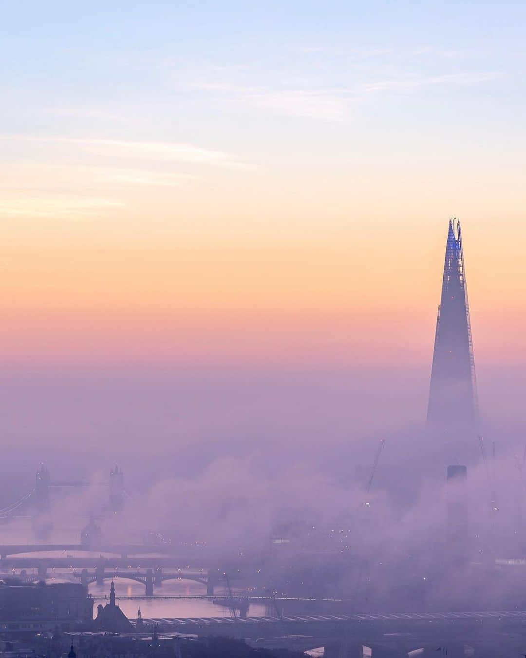 @LONDON | TAG #THISISLONDONさんのインスタグラム写真 - (@LONDON | TAG #THISISLONDONInstagram)「☁️ This morning’s sunrise by @londonfromtherooftops! ☁️ Fog descended all across #London... there’s some incredible photos appearing on Instagram, but *THIS* is a banger! 🔥   ___________________________________________  #thisislondon #lovelondon #london #londra #londonlife #londres #uk #visitlondon #british #🇬🇧 #theshard #shard #towerbridge #thames #londonfromtherooftops」11月5日 22時17分 - london