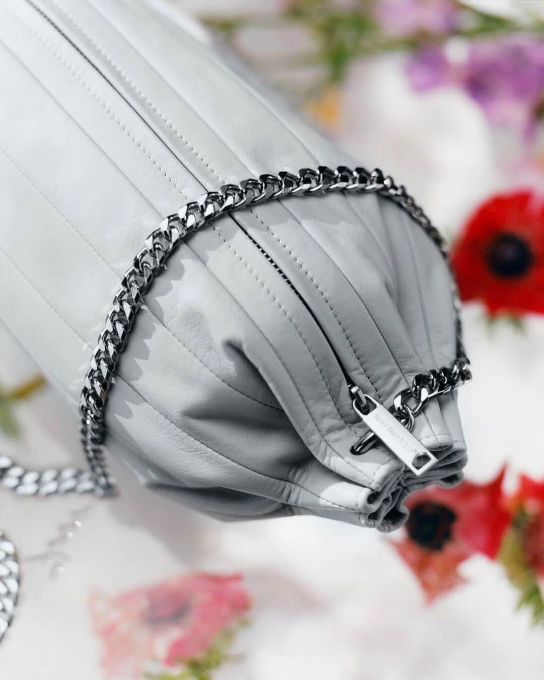 マリメッコのインスタグラム：「New in: our beloved Karla bag is now accompanied by a silver chain. The Karla bag comes in two sizes and two colors: grey and black. Find yours at marimekko.com and in-store. #marimekko」