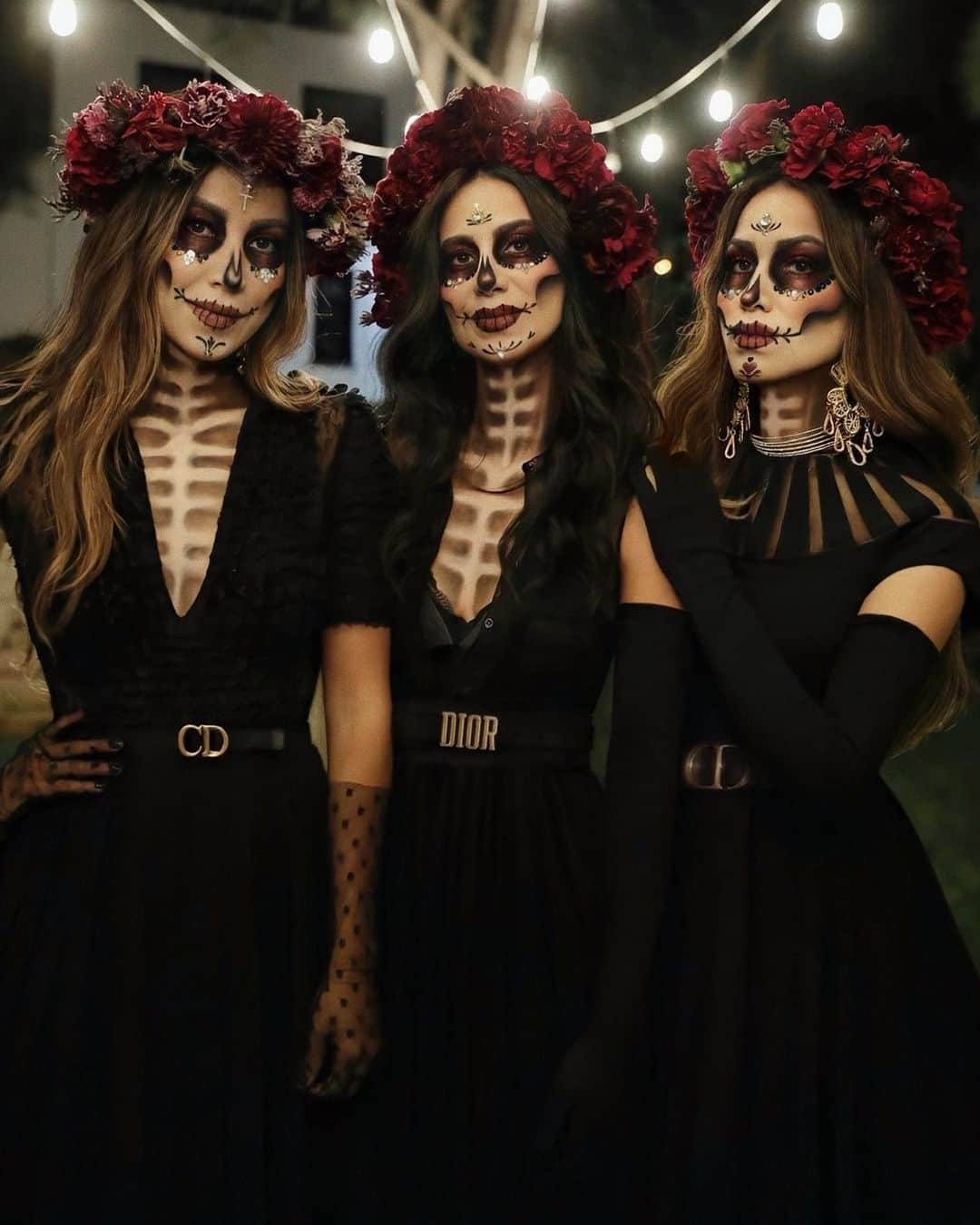 ジュリー・サリニャーナのインスタグラム：「Day of the Dead has come and past but that won’t stop me from sharing my annual Mexican tradition with my beautiful sisters @lilylove213 & @ari.sari.loves while taking a moment to celebrate our dear loved ones who have left us.   This year, I’m beyond grateful and so honored that we got to partner with my beloved @dior family. It feels like a dream to share #ddlm and our culture with you while dressed in the RTW Pre-Fall 2020 collection, (someone pinch me please!!!) 😍😍  Being able to partner with an amazing fashion power house like Dior on such a  special Mexican holiday, with the people that mean the most to me, is a pretty indescribable feeling! Thank you @dior for being a part of our special tradition - This is one memory that I will always remember and cherish! 🖤🤍💀✨」