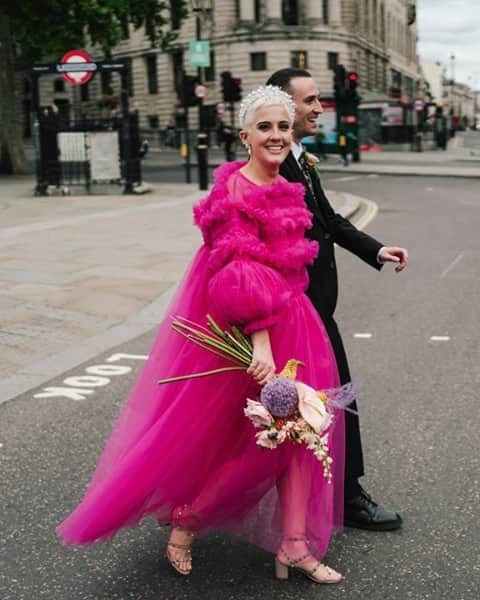 British Vogueさんのインスタグラム写真 - (British VogueInstagram)「When @Harri.Grace wedding was downscaled, she opted for a shocking pink tulle explosion of a @MollyGoddard dress that, much like the nuptials themselves, was a small rebellion against the times. Click the link in bio for more on why the bride wore fuchsia.  Photographed by @LisaJanePhoto.」11月7日 20時01分 - britishvogue