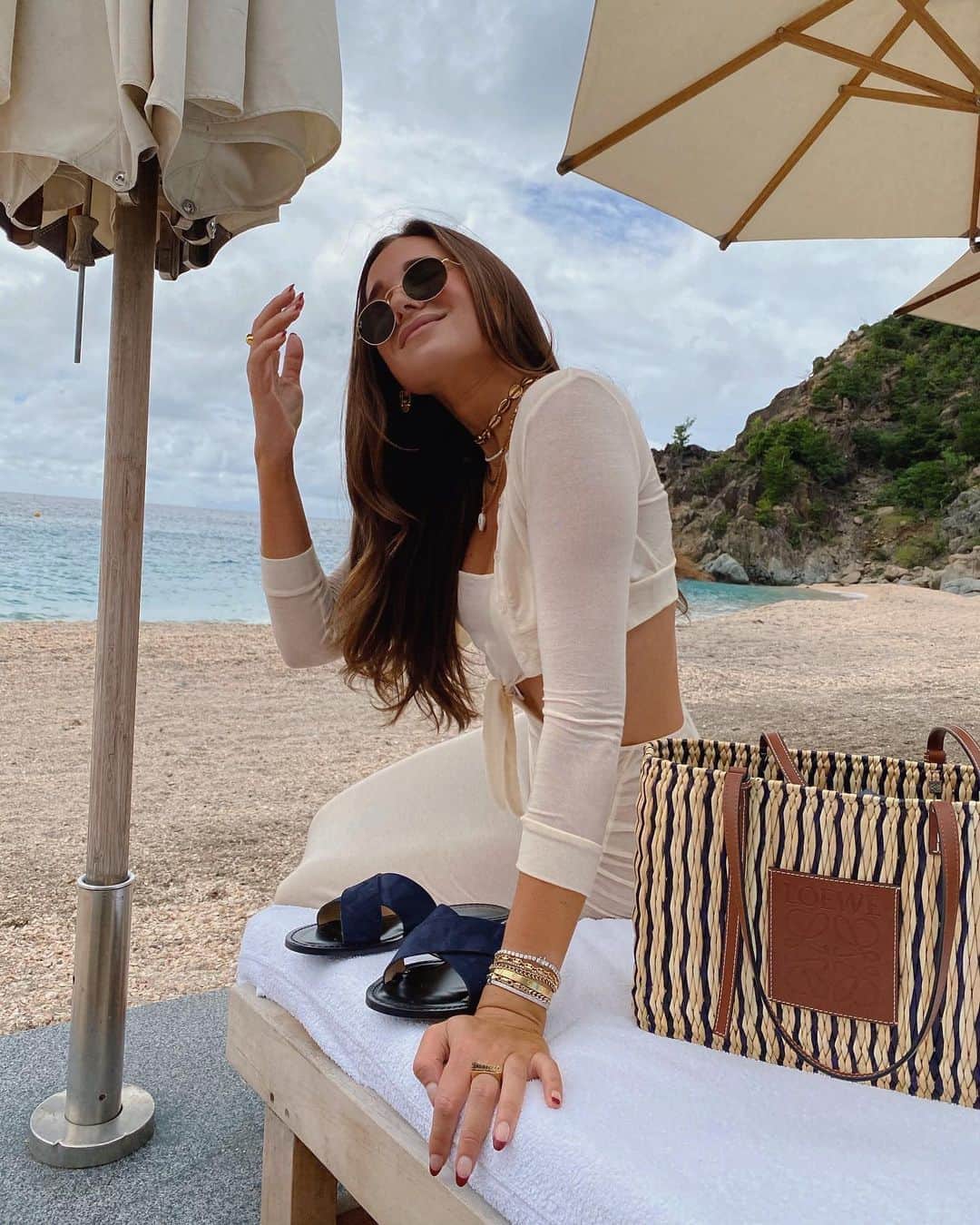 We Wore Whatのインスタグラム：「Two years ago on this beach @shellona_stbarth I stood up and loudly asked “does anyone have any eligible bachelors in New York to set me up with” - and minutes later was looped into the first text with my man whose first question was “but do you like Hawaiian shirts”🥰」