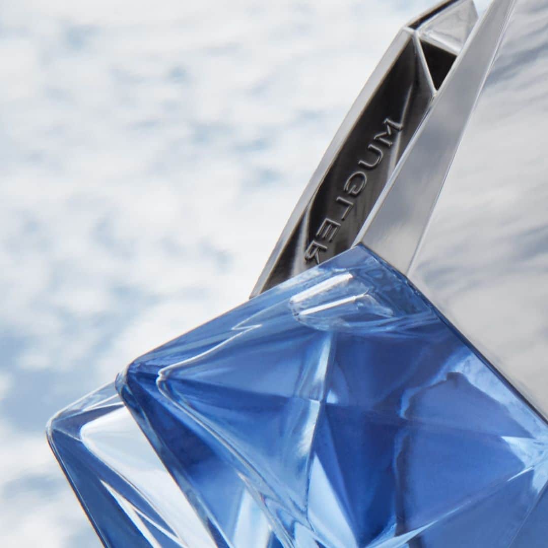 ミュグレーのインスタグラム：「The proudest member of the Oriental Gourmand scent family, Angel is a mysterious and addictive multifaceted fragrance. Are you ready to open the doors of the unknown, somewhere between heaven and earth?  #MuglerAngel #WilderThanDreams」