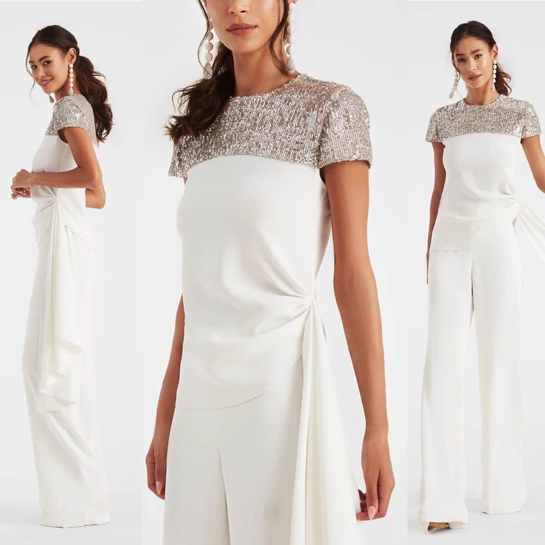 のインスタグラム：「The Claudia blouse featured in elegant ivory lightweight crepe with side sash,  featuring a contrast micro-sequin bodice in platinum at the front with a cap sleeve.#celebrate, #sachinandbabi, #sparkle, #shine」