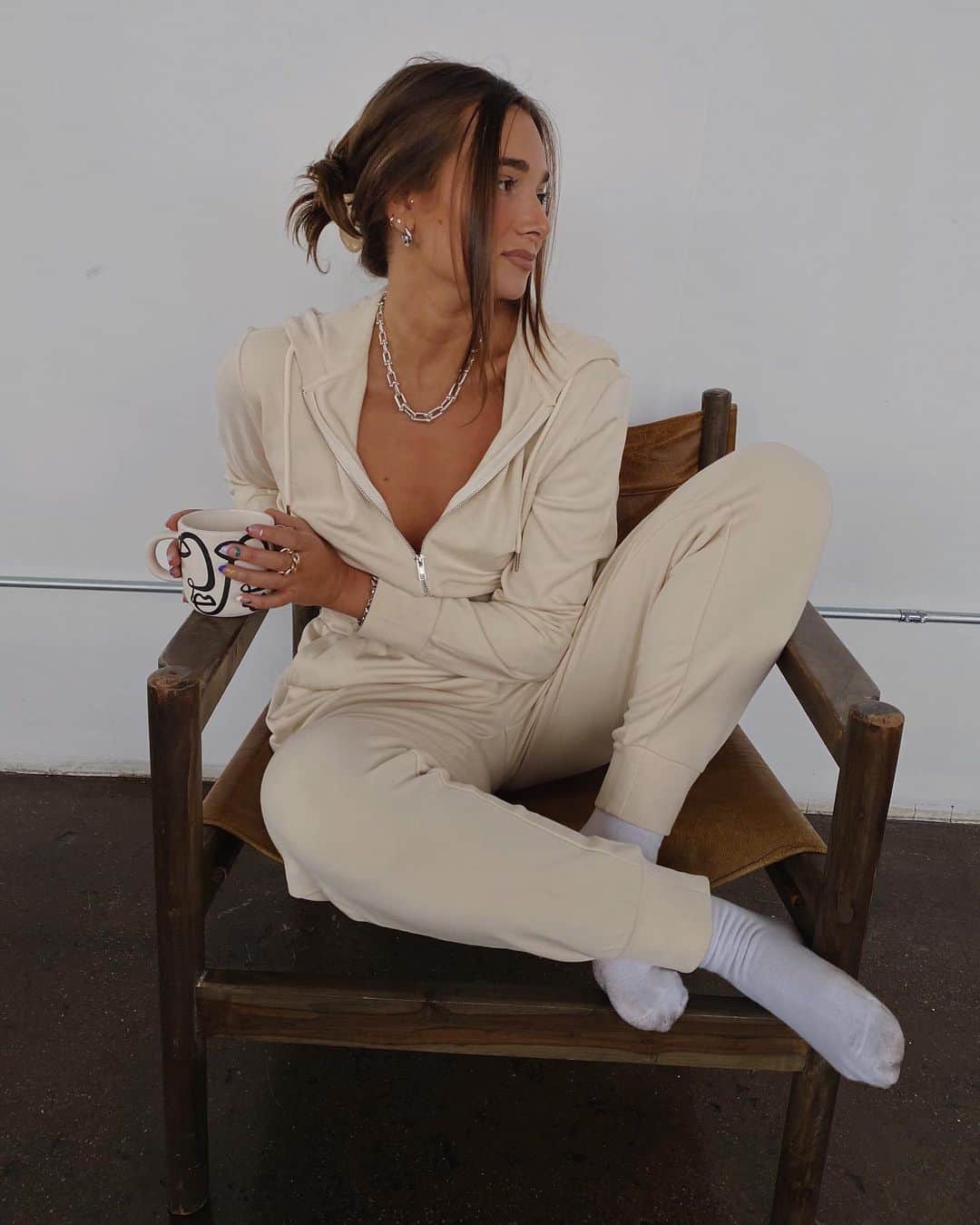 We Wore Whatのインスタグラム：「New new newwwwwwwness, so many pieces I’ve been dying to share with you guys • the leisure suit, our new mom jeans, cutout overalls in black and white twill, low rise rocker jeans with detachable chain, Danielle jean with crystal buttons, the aprés ski jumpsuit, stiletto slit, and jagger stripes! I’ll be answering questions and posting a fit guide tomorrow! This collection drops Tuesday on @shopweworewhat 🔥 what’s your fav so far?!」