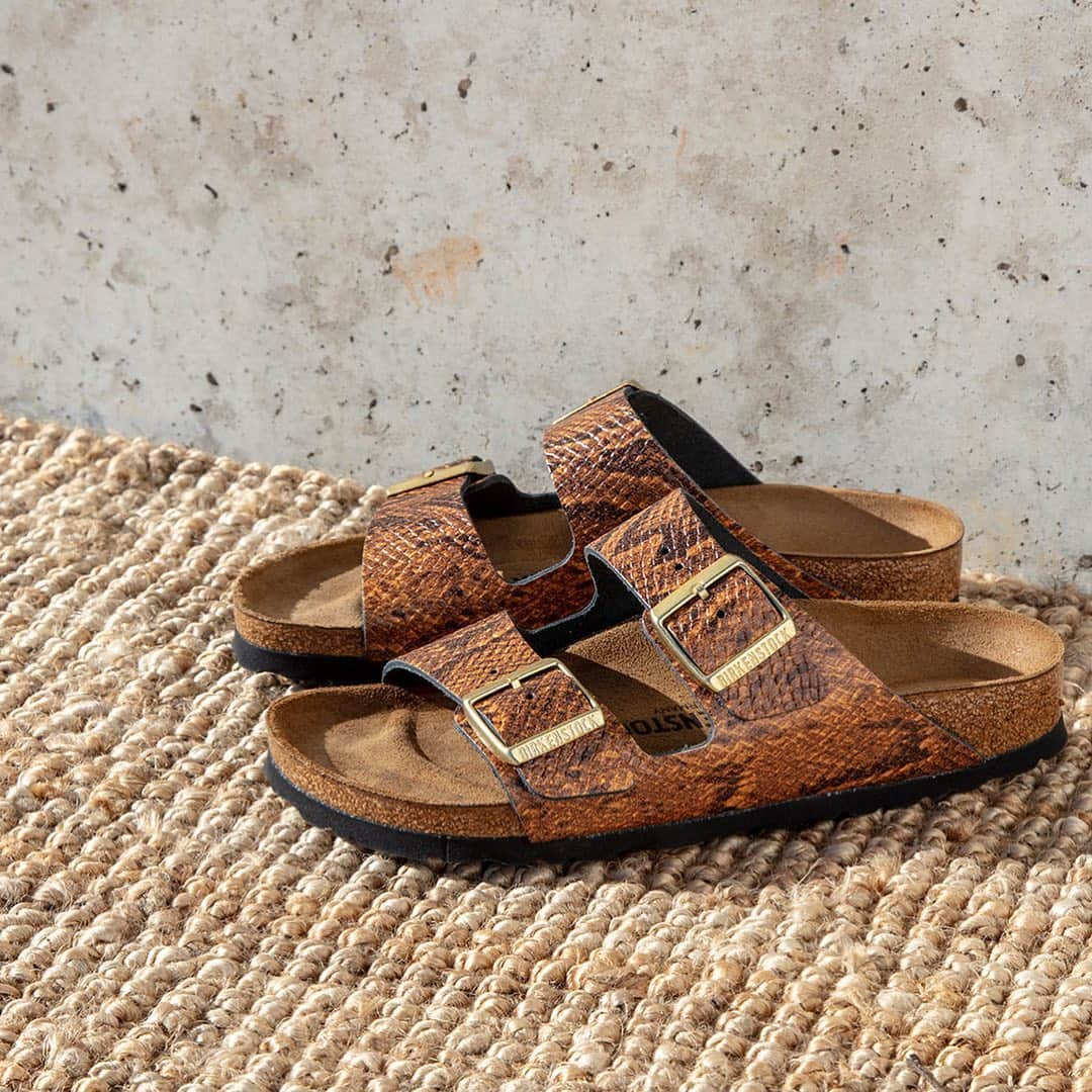 カレンウォーカーのインスタグラム：「BIRKENSTOCK WEATHER! Our Birkenstock edit sees the legendary ‘Arizona’ in new snakeskin, suede and metallic finishes alongside vivid shades of EVA and nubuck. See the full selection in-store or on karenwalker.com (complimentary shipping)」