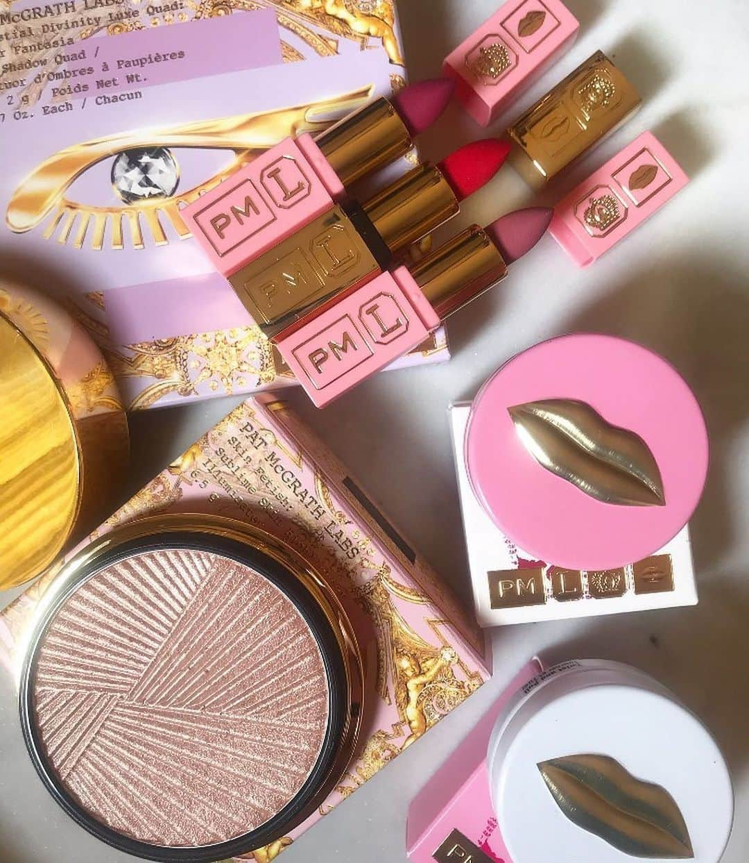 パット・マグラスさんのインスタグラム写真 - (パット・マグラスInstagram)「LAB LOVE LUXURIES ⚡️⚡️⚡️ Mother LOVES this gorgeous display of #patmcgrathlabs by the DIVINE @amalshine, featuring MAJOR goodies from the Celestial Divinity Collection. ADORE YOU! xx Pat ⚡️⚡️⚡️ Add these to your list and shop them NOW on PATMcGRATH.COM  Shop:  — Celestial Divinity Luxe Quad: Fleur Fantasia  — LUST: Luxe Lip Balm  — Gilty Pleasures Mini Lip Trio  — Sublime Skin Highlighter」11月10日 0時00分 - patmcgrathreal