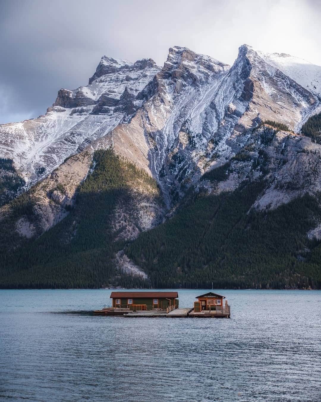 Explore Canadaのインスタグラム：「Did you know there’s an entire ghost town that sits at the bottom of Lake Minnewanka? About sixty feet below, the old town of Minnewanka Landing has been well preserved and makes for an unparalleled diving experience - as long as you don’t mind the cold 😉 #ExploreCanada #CanadaNice⁠ ⁠ *Know before you go! Check the most up-to-date travel restrictions and border closures before planning your trip and if you're travelling in Canada, download the COVID Alert app to your mobile device.*⁠ ⁠ 📷: @andyescapes⁠ 📍: @banff_lakelouise, @travelalberta⁠ ⁠ #MyBanff #ExploreAlberta #TravelAlberta⁠」