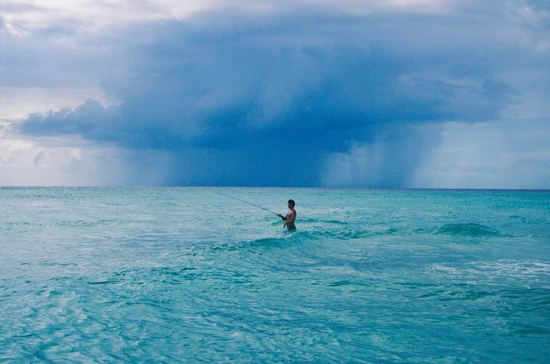 National Geographic Travelさんのインスタグラム写真 - (National Geographic TravelInstagram)「Photo by @joshuacogan / Fisherman Lee Dooley fly casts into the surf off the western coast of Saint Croix in the U.S. Virgin Islands as a storm gathers. Watching the beauty of fly casting as the hydrological cycle played out in the surrounding ocean was something I will never forget. To see more images about our relationship to the natural world, follow me @joshuacogan. #USVI #STCROIX」11月10日 16時39分 - natgeotravel
