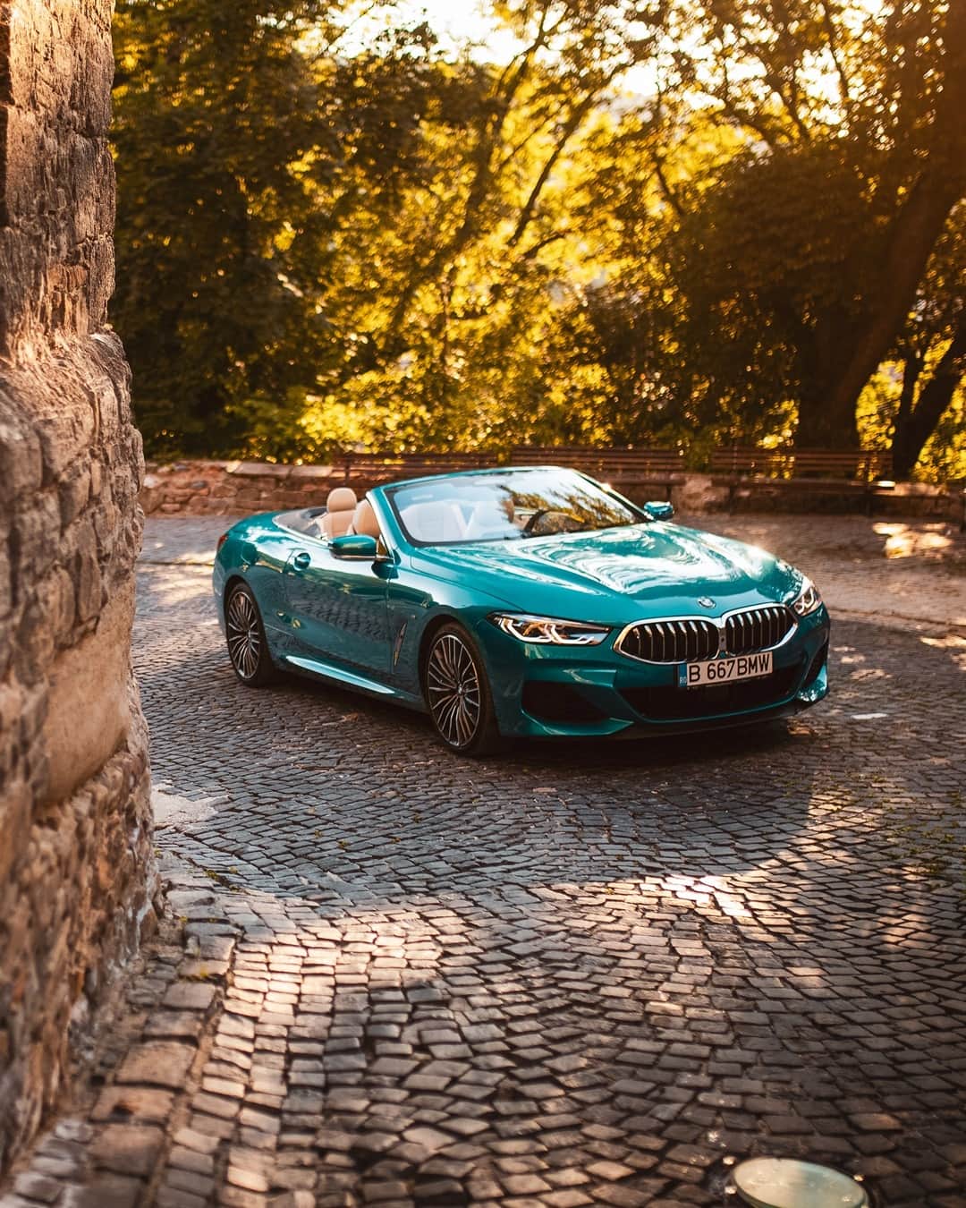 BMWのインスタグラム：「On a grey winter day, what do you dream of? The BMW 8 Series Convertible #THE8 #BMW #8Series #BMWrepost @ciprianmihai  __ BMW M850i xDrive Convertible: Fuel consumption in l/100 km (combined): 10.2–10.0. CO2 emissions in g/km (combined): 231–228. Further information: www.bmw.com/disclaimer.  	 Acceleration (0-100 km/h): 3.9 s. Power: 390 kW, 530 hp, 750 Nm. Top speed (limited): 250 km/h.」