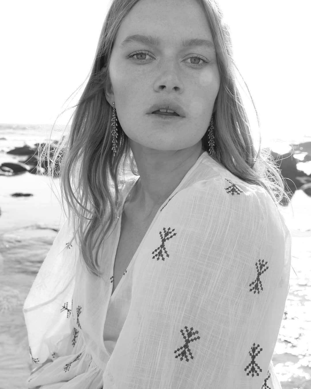 ミーガンパークのインスタグラム：「Relaxed summer styles in store now // Alice wears the Elvia Wrap Top – a lightweight textured-cotton voile embroidered with elegant, artisanal stitch work. Discover the Elvia collection online now x」