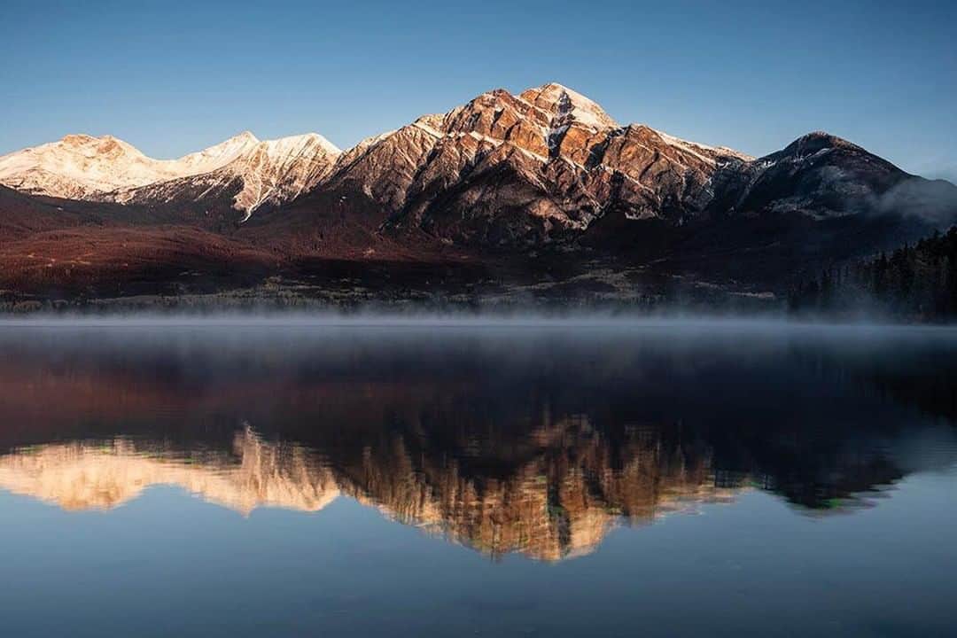 Ricoh Imagingのインスタグラム：「This beautiful mountain reflection was captured by our #teampentax fan Tom Weatherhead Photography with the Pentax K1 Mark II using the 18-135mm. 1/13 sec f/11 ISO 100.」