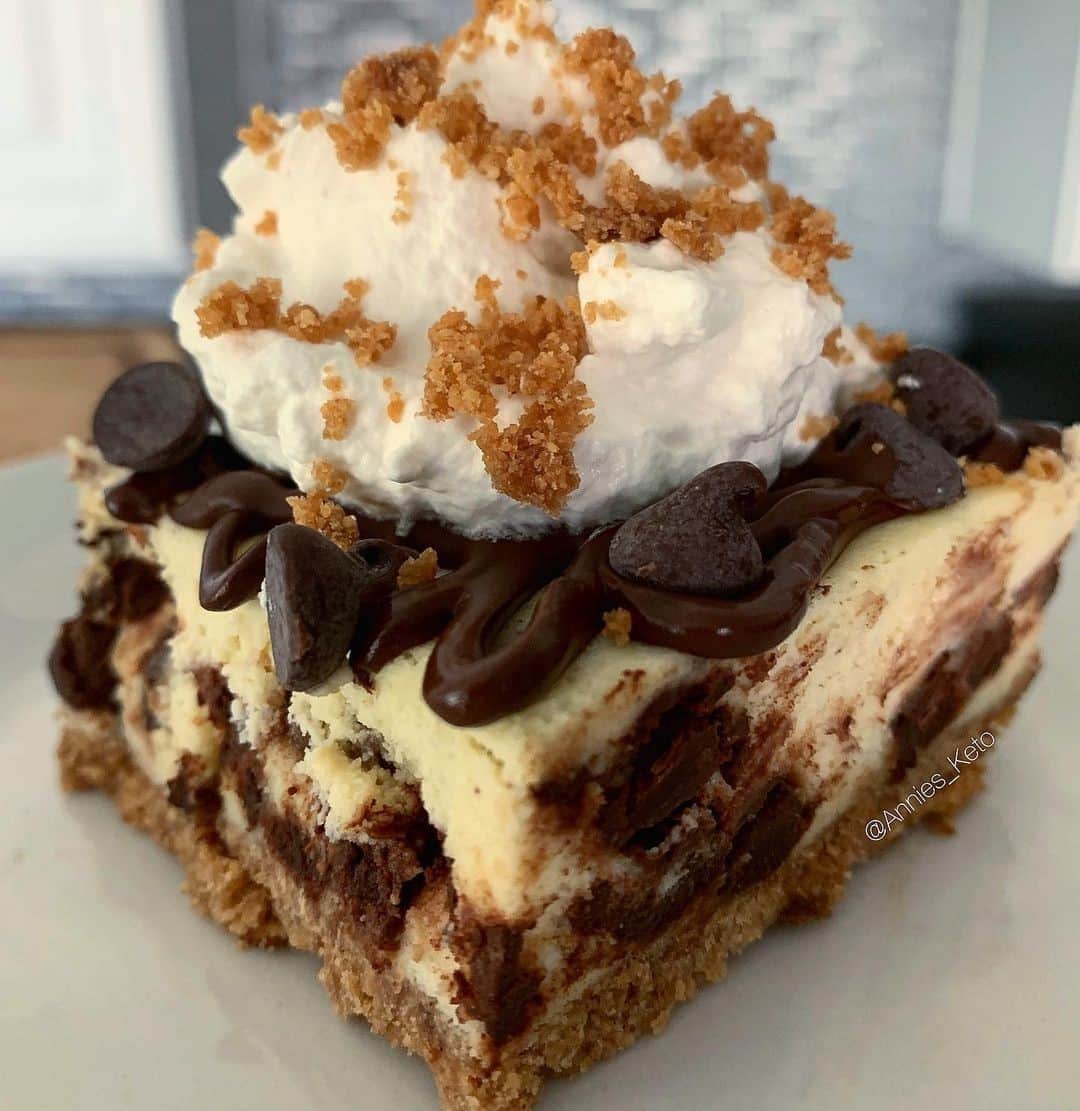 Flavorgod Seasoningsさんのインスタグラム写真 - (Flavorgod SeasoningsInstagram)「Keto Cannoli Cheesecake!! by FlavorGod customer @annies_keto⁠ -⁠ Add delicious flavors to your meals!⬇️⁠ Click link in the bio -> @flavorgod  www.flavorgod.com⁠ -⁠ "Holy cannoli! I made a keto cannoli cheesecake! This was so delicious and easily one of my new favorites! Hard to believe this one was sugar free and was actually better tasting than a traditional cannoli! The key component in making this was using @cutdacarb flatbread for the crust & @flavorgod seasoning, it gives it that cannoli crunch & flavor!"⁠ ⁠ Cheesecake filling:⁠ -8oz room temp cream cheese⁠ -8oz ricotta cheese⁠ -2 eggs⁠ -1/4 cup sweetener of choice⁠ -2 tsp vanilla extract⁠ -1 tsp cinnamon⁠ -1 cup sugar free chocolate chips. I used Hershey’s brand sugar free milk chocolate chips⁠ •Using a hand mixer whip cream cheese and ricotta cheese together, then add sweetener, add one egg at a time, & add vanilla extract & cinnamon. Hand mix in chocolate chips⁠ ⁠ @cutdacarb cannoli crust:⁠ -7 flatbread sheets⁠ -1/2 stick butter; melted⁠ -2 TBS @flavorgod chocolate donut flavoring⁠ -1 tsp vanilla extract⁠ -1 TBS sweetener of choice⁠ •Bake flatbreads at 200 degrees for 20 minutes. You basically want to dry them out without browning them. Gently break them apart once they are cooled, & pulverize in a blender.⁠ In a bowl add your melted butter, vanilla extract, @cutdacarb bread crumbs, sweetener, & @flavorgod chocolate donut seasoning, mix well (set aside a few TBS of crumb mixture for garnishment if desired) firmly pack into baking pan of choice, bake 10 min at 350 degrees. Let cool completely⁠ ⁠ -add cheesecake mixture to top of cooled crust. Bake in a water bath at 350 degrees for 30-40 minutes depending on your oven. When toothpick comes out clean from the center it’s done.⁠ Cool to room temperature, put in fridge for atleast 2 hours to completely cool. Top with melted chocolate chips drizzle, & more chocolate chips if desired, & homemade whip cream. Going homemade on the whip cream will make this a home run! I just whipped together some heavy cream, sweetener, & vanilla extract with a hand mixer until I hit my desired texture!⁠」11月11日 22時02分 - flavorgod