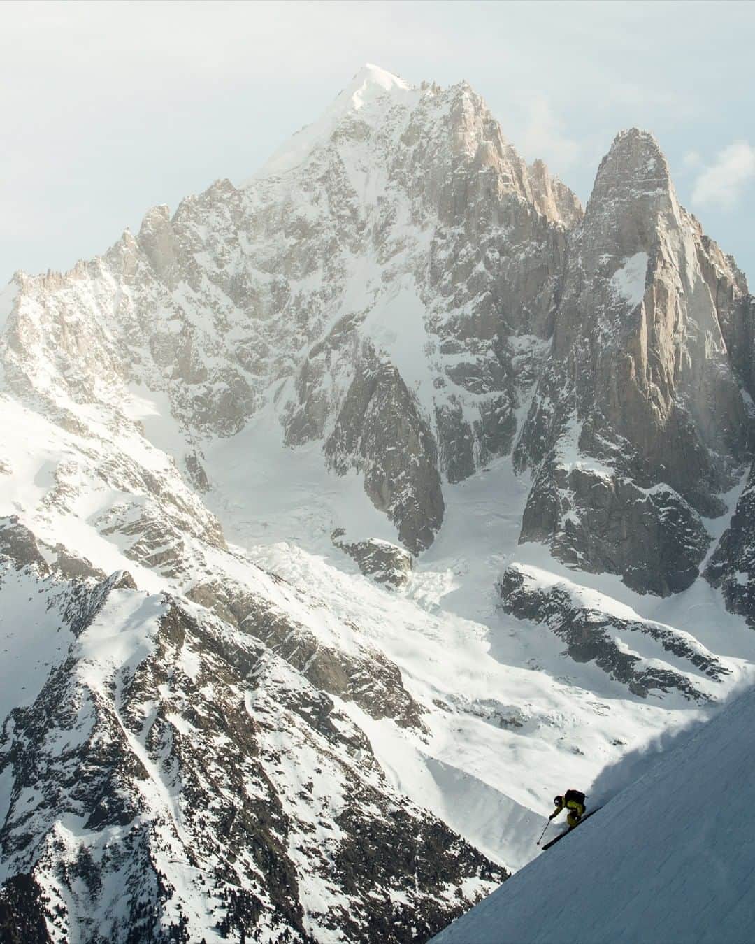 ミレーのインスタグラム：「′′Many years ago, the @compagniedesguidesdechamonix picked the Drus from all the mountains in the Mont-Blanc massif to be featured on the medal. A choice that is surely not harmless...  These two well-pointed needles, alone represent the symbol of verticality, inaccessibility and commitment."  When @dam_tomasi tells us about the Drus, we feel all the passion that drives him out through his words.  📷 @matt_georges   #MilletRiseUp」