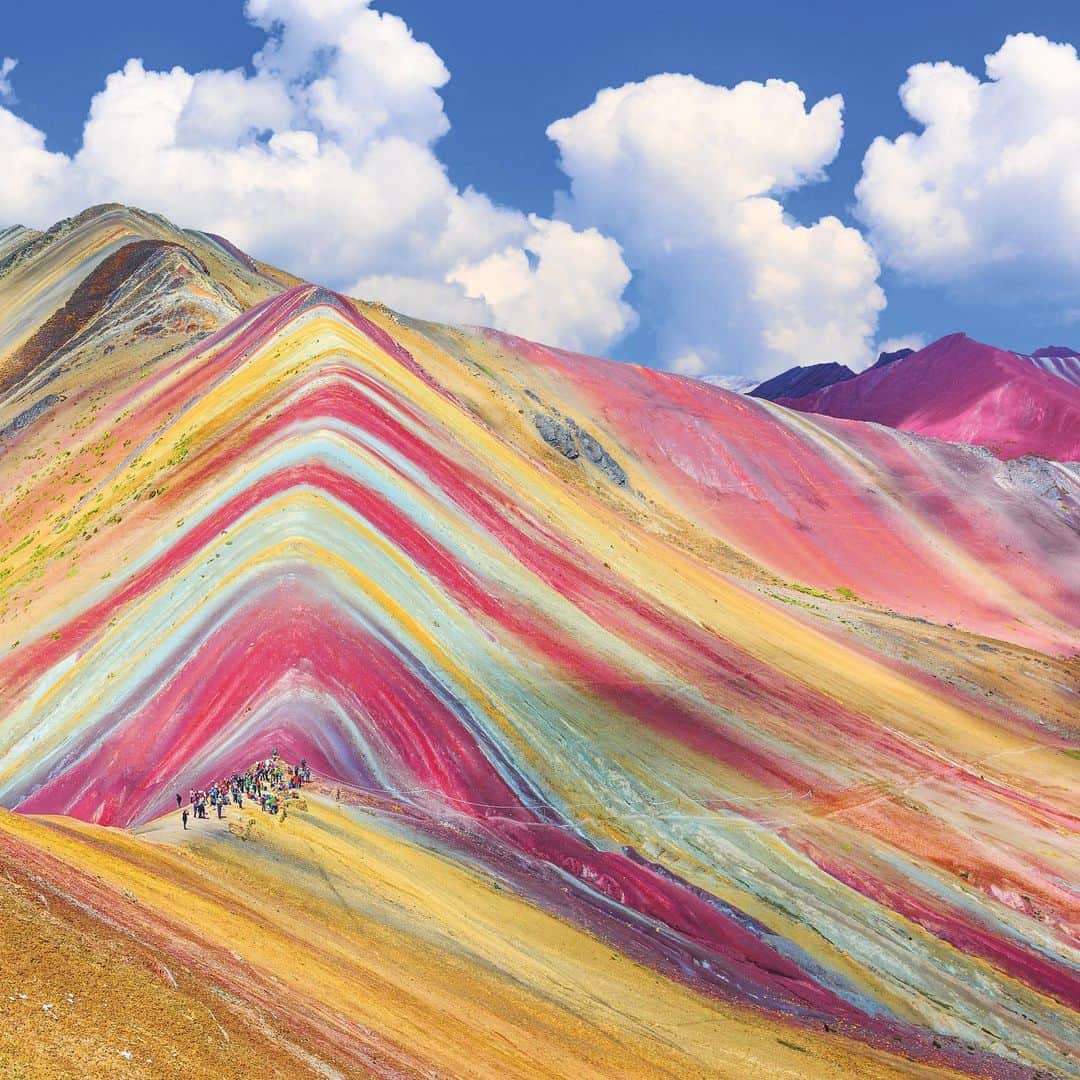 Lonely Planetのインスタグラム：「🌈Travel by the rainbow in our gorgeous new book.   ❤️🧡💛💚💙💜 Featuring 400 photographs of amazing destinations and events across a plethora of vivid shades you can discover the world through a stunning collection of images with the first and only travel guide by colour palette. How many of these have you visited?   🛍️Tap the link in our bio to shop.  🌈 Featured locations: Vinicunca, Peru Lake Hillier, Australia Namib Naukluft National Park, Namibia Meknes, Morocco Hangzhou, China Lighthouse Reef, Belize Lisse, The Netherlands Kimba, Australia Hohenschwangau, Germany」
