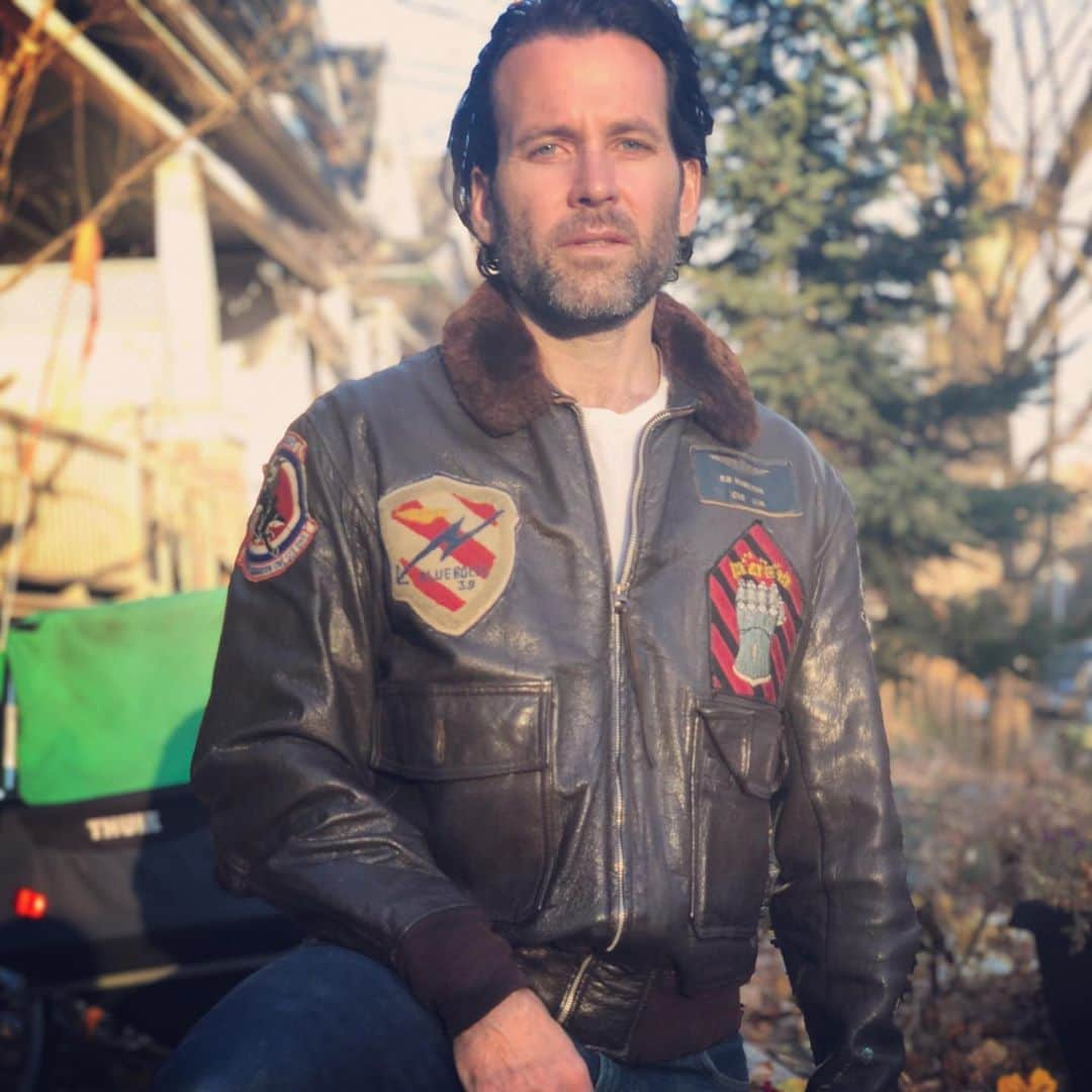 アイオン・ベイリーのインスタグラム：「Every year this day I throw on my Grandfathers flight jacket and take a pic. I can’t help but spend a good portion of the day thinking about all my family who have served and what it means; it’s some kind of meditation I engage in. War. What a fucked up, complex stew of courageous men and woman, the rocket riders, the grunts, jarheads, engineers, and scientists, but also the ethically bankrupt profiteers, the mercenaries, the swamp-thing politicians, all those opportunistic Jackals feeding on the carrion. When it’s all said and done, there are the ones who risked and lost their lives, and those who cash in and find cover; To expect anything else of war is to wish a day that does not yield to night; It’s just how it is. For all the Veterans who serve with honor and have to put up with all the rest; Respect. #veteransday2020 #veteransday #veterans #rememberanceday #bandofbrothers #easycompanymen」