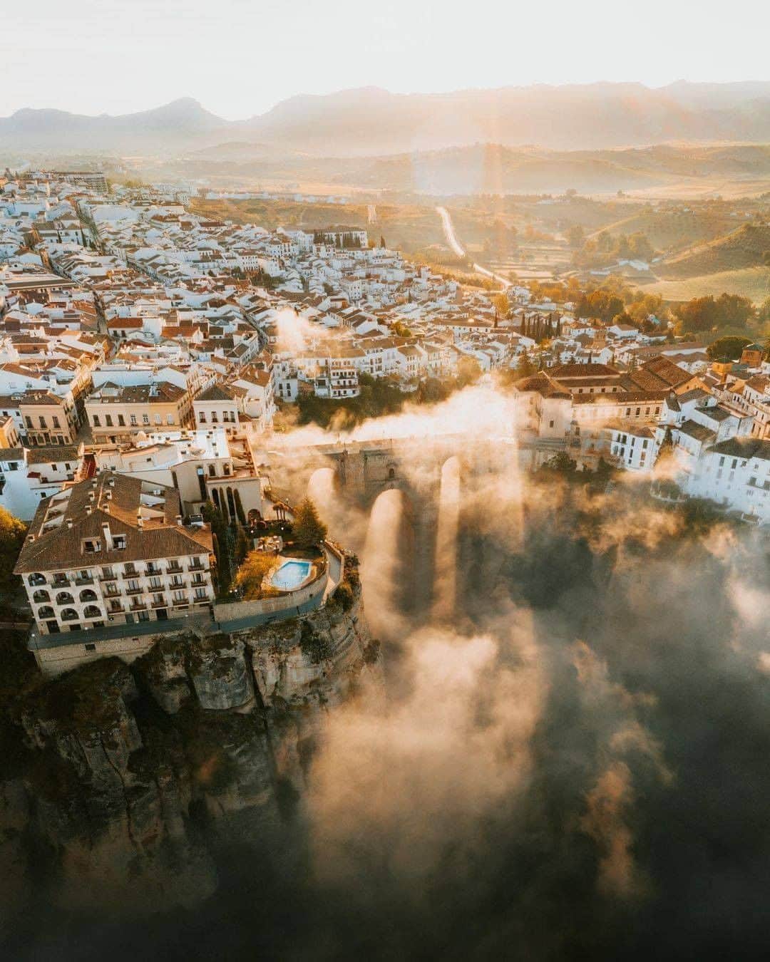 Discover Earthさんのインスタグラム写真 - (Discover EarthInstagram)「Beautiful shots of the city of Ronda. Which one is your favourite ?  "This morning was one where everything came together. A mountain storm from the night before had settled & rain condensed to form a misty inversion, which surrounded the plateaux where the ancient city of Ronda sits perched. We couldn’t believe it - we watched fog swirl and then vanish as it hit the cliff edge, light rays filtering through The Puente Nuevo bridge as the sun rose...conditions like these must happen only a few times a year I thought. What were the chances. Utter madness. " 💾  Save in your collections if you'd like to visit one day!  #discoverspain🇪🇸 with @jamesrelfdyer  . . . . .  #sunrise  #morning  #skylovers  #sunshine  #day  #instasky  #sunrise_sunsets_aroundworld  #horizon  #mothernature  #weather  #early  #all_sunsets  #tree  #twilight  #dusk  #dawn  #sunrise_and_sunsets  #sunsets  #spain  #españa ​  #espana  #ig_spain」11月12日 20時55分 - discoverearth