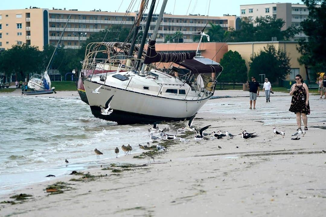 NBC Newsさんのインスタグラム写真 - (NBC NewsInstagram)「People walk past boats on a beach in the aftermath of Tropical Storm Eta in Gulfport, Florida.⁠ ⁠ More on the storm at the link in our bio.⁠ ⁠ 📷 Lynne Sladky / @apnews」11月13日 0時36分 - nbcnews