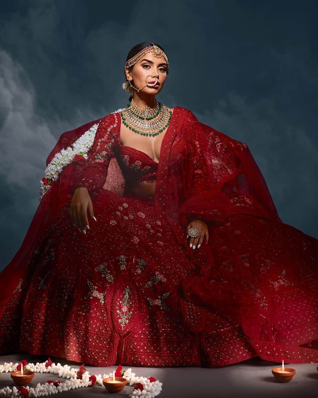 Diipa Büller-Khoslaのインスタグラム：「And now for the GRAND FINALE.. I (of course) went for a red ensemble! Created by the incredible duo @falgunishanepeacockindia 😍🙌🏽  Being an Indian in Europe makes me a global citizen but it also brings me closer to my culture. Even if I can’t travel to India as frequently, India will always be my idea of home and inspiration. Specially during Diwali, these sentiments run high. Looking forward to celebrating tonight with my family. 🪔🙏🏽 How are you celebrating #Diwali tonight? ❤️  Credits: Art Direction: @pedrojjdias & @bridelanindia Photography: @studiomartijnsenders MUA: @lorinmamomakeup @ctilburymakeup Jewelry: @rianajewellery」