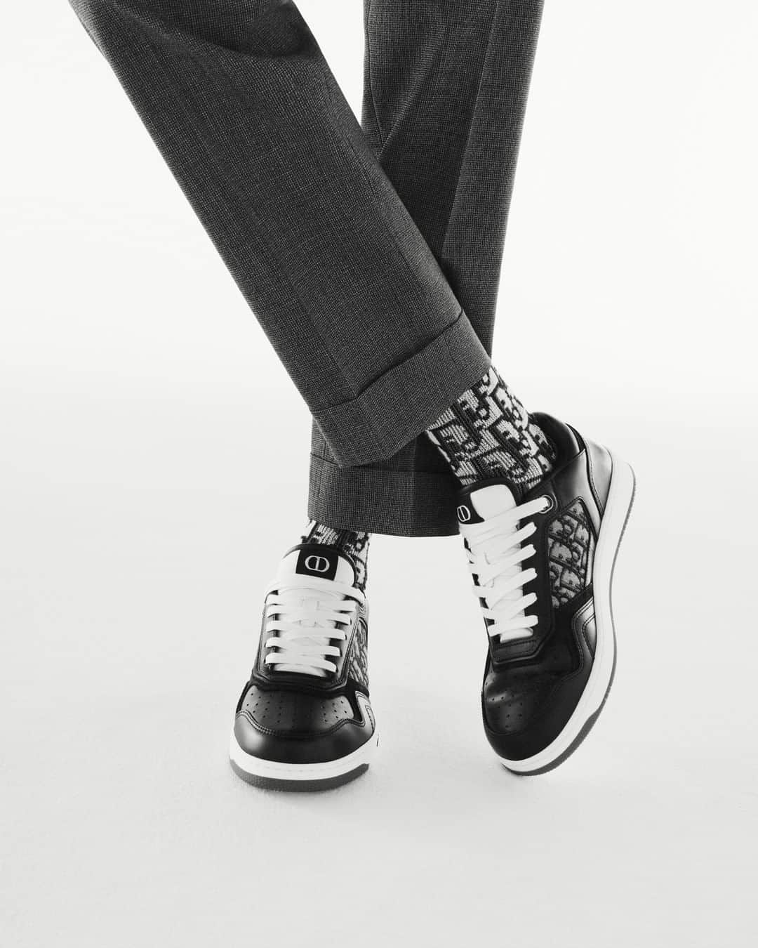 クリスチャンディオールさんのインスタグラム写真 - (クリスチャンディオールInstagram)「High-top or low, with #DiorOblique jacquard canvas or 'Galaxy' perforated leather detailing, #DiorB27 sneakers add an extra touch of contemporaneity to the  #DiorSpring21 men's #DiorModernTailoring capsule by @MrKimJones. Hems that are plain, zipped, cuffed or cropped allow for a variety of possibilities, with the latter showing how the addition of a pair of #DiorOblique socks really makes the look pop. © @Brett_Lloyd」11月14日 22時01分 - dior