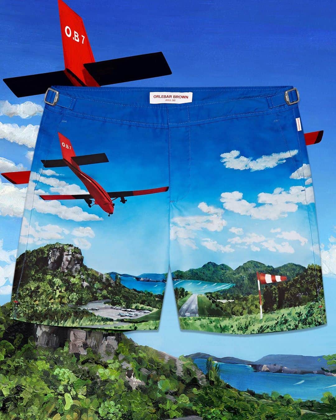 オールバーブラウンのインスタグラム：「Lucky enough to be in St Barts? Make sure you stop at our store to pick up the perfect souvenir. Painted by artist @AliceTye, the sunny scene on these limited edition Bulldog swim shorts may look familiar, that's because it depicts St Barts itself with a view of Gustaf III Airport. 🌍🏝🛬 📍 97133 Gustavia, Saint Barthélemy  Find other store locations in our bio.  #DoseOfSun #OrlebarBrown #OBsAroundTheWorld」