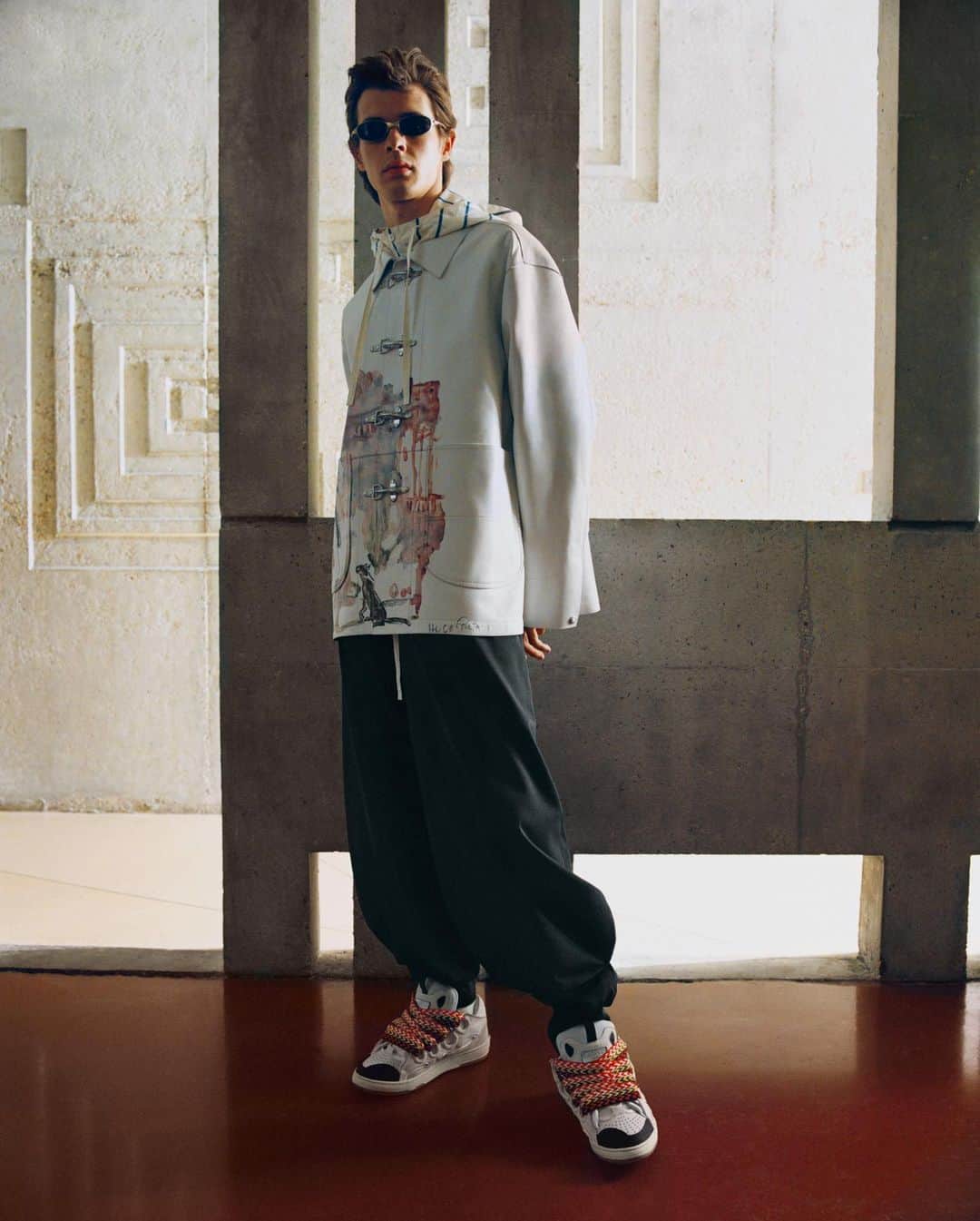 ランバンのインスタグラム：「#LanvinFW20 Corto Maltese painted peacoat. Available in stores.」