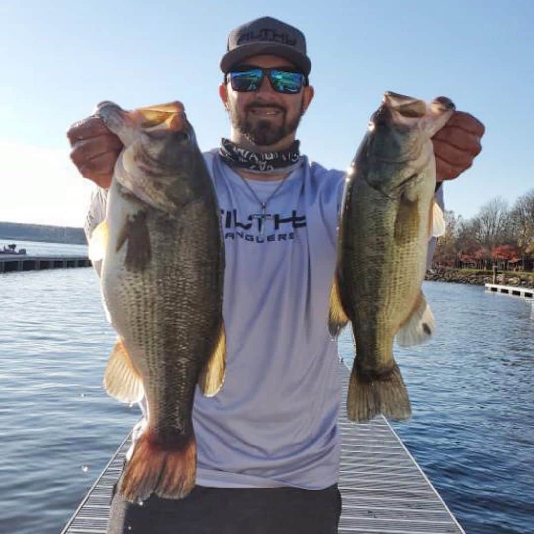 Filthy Anglers™のインスタグラム：「Team Filthy member Derrick @derricklozerfishing from Pennsylvania doing a little Filthy Double Fistin’ this weekend. Look at that chunk in his right hand, that’s an absolute tank, curious how big do you think she is?? (I’m saying 7.1lbs) Congrats on the catches my friend you are Certified Filthy! www.filthyanglers.com #fishing #bassfishing #bigbass #angler #bassfish #outdoors #nature #angler #anglerapproved #icefishing #hunting #bass #bassfishing #largemouth #largemouthbass」