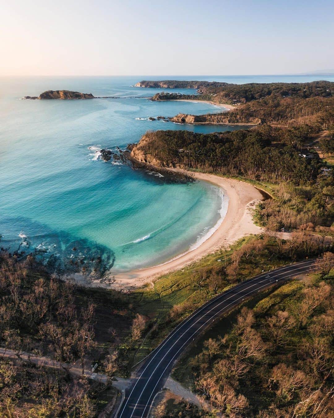 Australiaさんのインスタグラム写真 - (AustraliaInstagram)「We're flying over the magical #McKenziesBeach today, care to join us? @seeshots captured this amazing #drone shot in the @eurobodalla region of @visitnsw, which covers over 100 kilometres of sweeping coastline and lush hinterland along the south coast. You can visit the charming villages of #BatemansBay, #Broulee and #Narooma in this diverse region, or visit @mogowildlifepark or #MontagueIsland for an incredible wildlife encounter. Of course, no trip is complete without tasting the local produce, so head to #PearlyOysterBar for freshly shucked oysters, and @bodalladairy for farm-fresh milk and cheese 🧀 #seeaustralia #NewSouthWales #Eurobodalla #holidayherethisyear」11月17日 4時00分 - australia
