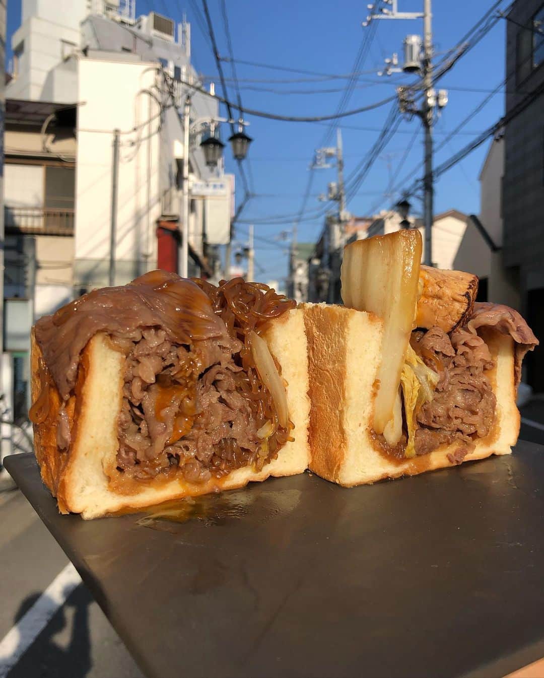 Coffee & Toast Tokyoさんのインスタグラム写真 - (Coffee & Toast TokyoInstagram)「すき焼きぱん！ 🥩🥩🥩🥩🥩 . ちょっと贅沢なまかないで、 すき焼きぱん、 作ってみました！ . 甘辛い味が染み込んだ牛肉、白菜、 しらたき、焼き豆腐に、 卵黄をかけると、 パンともピッタリな 味わい😋😋😋😋 . 今週末、 11月21.22.23日の3日間、 数量限定ですが、 ご提供させていただきます。 ご興味ある方は、 ぜひ、この機会に🤗 . . .  #トースト #トーストアレンジ #食パンアレンジ #田園都市線カフェ #田園都市線パン #食パン #世田谷カフェ #東京パン屋 #パンスタグラム  #吐司 #paingrillé #torrada #toast #toasttuesday #tostadas #東京カフェ  #三軒茶屋カフェ  #すき焼き #肉 #にく #スキヤキ #sukiyaki #meat #すき焼きぱん」11月17日 15時40分 - coffeetoast2