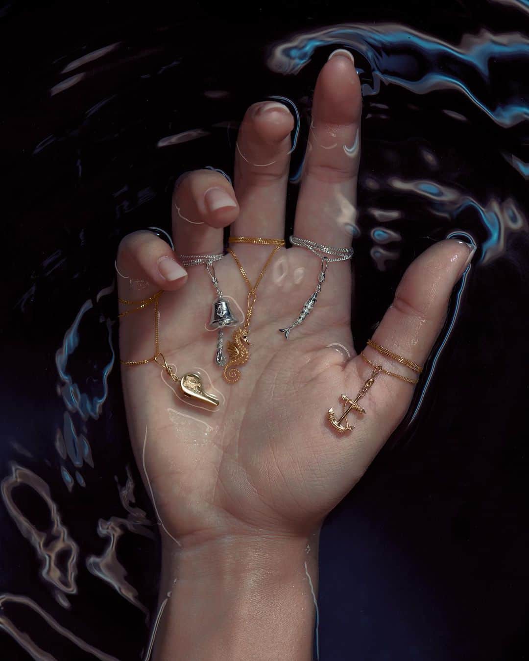 カレンウォーカーのインスタグラム：「New additions to The Navigator collection // Sea creatures, a KW ship’s bell and anchor and a fully functioning Runaway Girl whistle as fine jewellery cast in 9 carat gold, rose gold or sterling silver.」