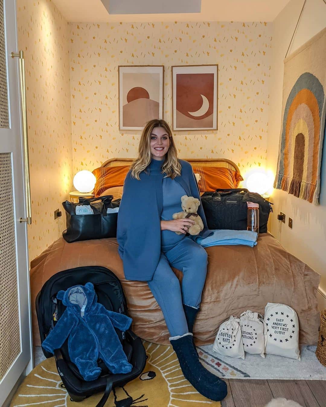 Ashley Jamesさんのインスタグラム写真 - (Ashley JamesInstagram)「Well the hospital bags are all packed and we're ready to go... Just waiting for you baby boy! 🤰🏼💙 I wanted to share my hospital bag list for anyone who's doing their research (or will be thinking about it soon). I've created a highlights with all of the individual items I've decided to pack, so you can check that out if it helps, but obviously there's no right or wrong way to pack. Everyone's birth experiences are so unique and everyone will tell you different things. The only things that have come up that I haven't added to the list are: headphones, chewing gum (in case of a C Section), and a fan. I'll have to report back with what I used and didn't use after birth, but like I said everyone's experience will be so different anyway. 💁🏼‍♀️ For me, the researching and packing has been so exciting, and I feel empowered that I've got everything for almost every eventuality! But I've got no birth plan and don't want one - we're all allowed to prepare differently in the way that fits for us, so don't feel overwhelmed with my Mary Poppins bags. Hope it's helpful or offers some inspiration though. 💞  I've tagged some of the bits in his room too, I loved decorating the spare room over the last lockdown. I wanted something really neutral that nodded to our love of adventure and travel. I'll have to do a before / after because I can't believe how much this room transformed from a little box room. Anyway, I've still got a few weeks to go, but I couldn't be more excited about childbirth and bringing this little boy into the world. I've packed a lot of bags during my years of travelling, but this definitely feels like packing for the biggest adventure yet! 🥰🤰🏼 #hospitalbag #33weekspregnant   PS my gran bought this teddy bear for me in 1987.」11月19日 4時21分 - ashleylouisejames
