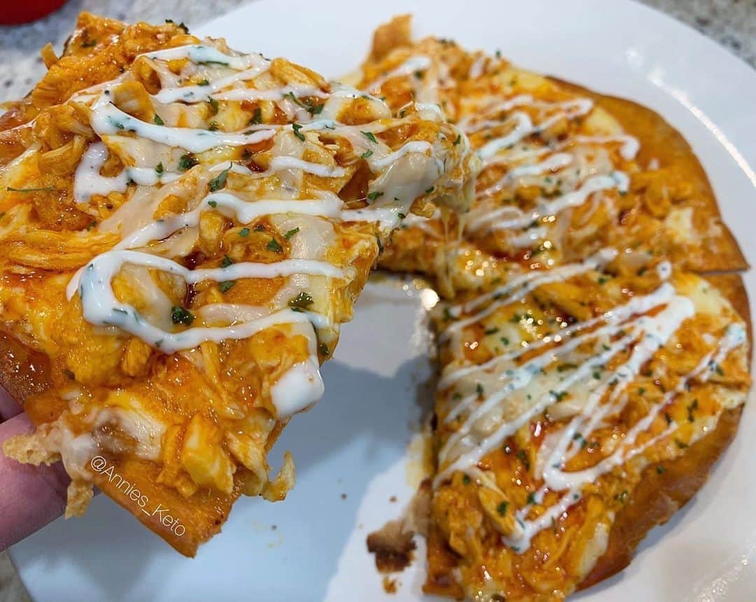 Flavorgod Seasoningsさんのインスタグラム写真 - (Flavorgod SeasoningsInstagram)「Buffalo chicken pizza using a 5 net carb @romerostortillas tortilla for the lunch win! by @annies_keto using FlavorGod Buffalo Seasoning!⁠ -⁠ KETO friendly flavors available here ⬇️⁠ Click link in the bio -> @flavorgod⁠ www.flavorgod.com⁠ -⁠ This is by far my favorite way to use up left overs and to use up what I have on hand!⁠ -⁠ In a skillet on medium/high heat I sprayed some cooking oil, threw my tortilla in, crisped up both sides then dropped the flame to low. I brushed some buffalo sauce on the tortilla, topped with mozzarella cheese and some left over roasted chicken breast that I had diced up and tossed with some buffalo sauce that I mixed with some melted butter and a few dashes of @flavorgod buffalo seasoning to kick up the flavor notch a bit! I covered the skillet then let it cook on low for 5-7 min to let the heat melt the cheese and crisp up the bottom of the tortilla even more.⁠ ⁠ This method will make for a crispy crunchy crust! It won’t get soggy! I also made some ranch to top with using @flavorgod ranch seasoning that I mixed with some mayo, a dash of garlic powder, pepper, parsley, and a dash of milk to thin it out, it made for some good ranch💁🏻‍♀️⁠ -⁠ Flavor God Seasonings are:⁠ 💥ZERO CALORIES PER SERVING⁠ 🔥0 SUGAR PER SERVING ⁠ 💥GLUTEN FREE⁠ 🔥KETO FRIENDLY⁠ 💥PALEO FRIENDLY⁠ -⁠ #food #foodie #flavorgod #seasonings #glutenfree #mealprep #seasonings #breakfast #lunch #dinner #yummy #delicious #foodporn」11月19日 11時01分 - flavorgod