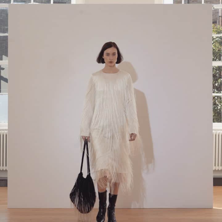 シャロン ワコブのインスタグラム：「Our Hand Embroidered Silk Fringe Dress #sharonwauchob #white #fringe #feather #iconpieces #silk #fall2020」