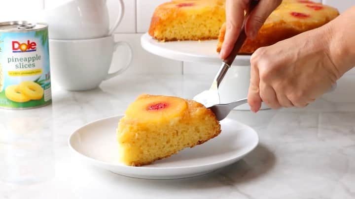 Dole Packaged Foods（ドール）のインスタグラム：「This year, #NationalCakeDay falls on Thanksgiving. Pumpkin pie, you’ve met your match. 🍍   INGREDIENTS: 1 can (20 oz.) DOLE® Canned Pineapple Slices in 100% Pineapple Juice  1/4 cup butter or margarine, melted 2/3 cup packed brown sugar 10 maraschino cherries 1 pkg. (2-layer size) PILLSBURY Pineapple Flavored or Yellow Cake Mix  DIRECTIONS: 1) Drain pineapple slices; reserve 3/4 cup juice. 2) Stir together melted butter and brown sugar in 12-inch skillet with heat-proof handle. Arrange pineapple slices in sugar mixture. Place cherry in center of each pineapple slice. 3) Prepare cake mix according to package directions, replacing some of the water with reserved 3/4 cup juice that is needed to prepare the batter. Pour batter evenly over pineapple. 4) Bake at 350º F, 35 to 40 minutes or until toothpick inserted in center comes out clean. Cool 5 minutes. Loosen edges and invert onto serving platter.」