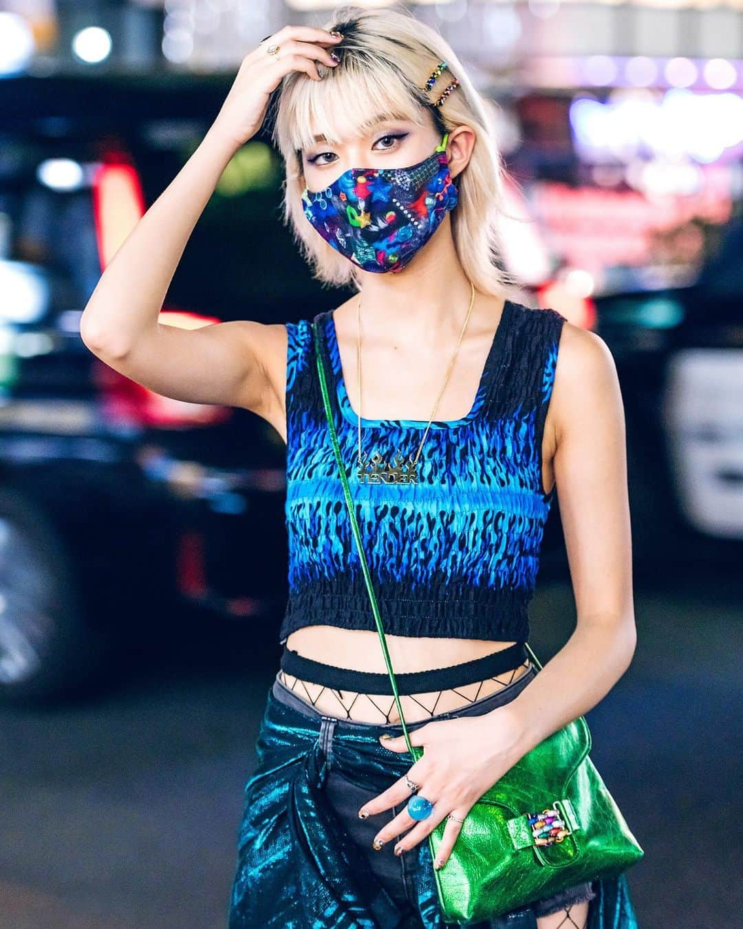 Harajuku Japanさんのインスタグラム写真 - (Harajuku JapanInstagram)「English-speaking Japanese street style personality Rikarin (@rikarin0526) on the street in Harajuku wearing a graphic crop top from Bluesis Tokyo with denim shorts, a scarf tied to look like a skirt, a metallic Bluesis bag, Yello Japan snakeskin cowboy boots, and a Tender Person necklace. Swipe left to see her cowboy boots.」11月20日 4時10分 - tokyofashion