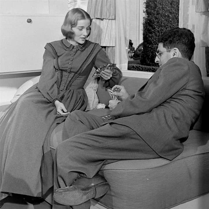 lifeのインスタグラム：「Joan Fontaine plays gin rummy with gossip columnist Sidney Skolsky on the set of "Jane Eyre," 1943. For more of our favorite Hollywood card games, tap the link in bio. (📷John Florea/LIFE Picture Collection)  #joanfontaine #janeeyre #1940shollywood #ginrummy #playingcards #sidneyskolsky」