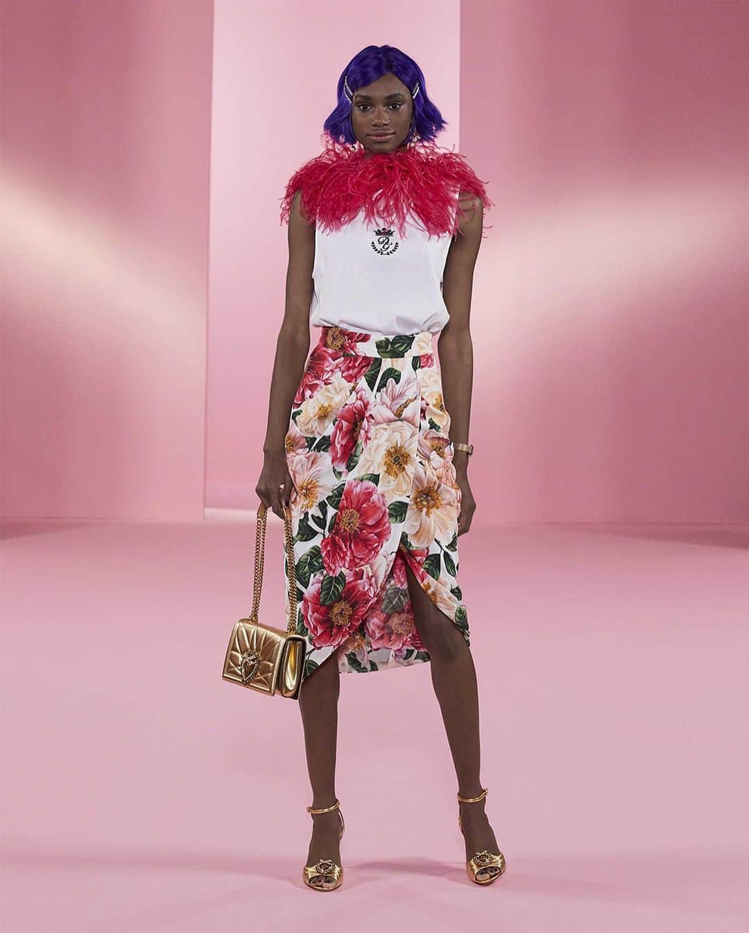 ドルチェ&ガッバーナさんのインスタグラム写真 - (ドルチェ&ガッバーナInstagram)「#DolceGabbana presents #DGDigitalShow2: Power Pastel ⠀ The new Women’s collection features the perfect combination of soft colours, clean silhouettes and floral details.⠀  The looks are made up of a bustier midi dress in lamé jacquard with bejewelled flats, a matching lace bustier and trousers with a #DGDevotion belt and #DGDaymaster sneakers, and a jersey t-shirt with marabou trim paired with a floral skirt and gold #DGDevotion high heel sandals.⠀ ⠀ The outfits are embellished with a #DGDolceBox and two quilted versions of the #DGDevotionBag. ⠀ ⠀ Discover the looks at the link in bio.」12月19日 22時59分 - dolcegabbana