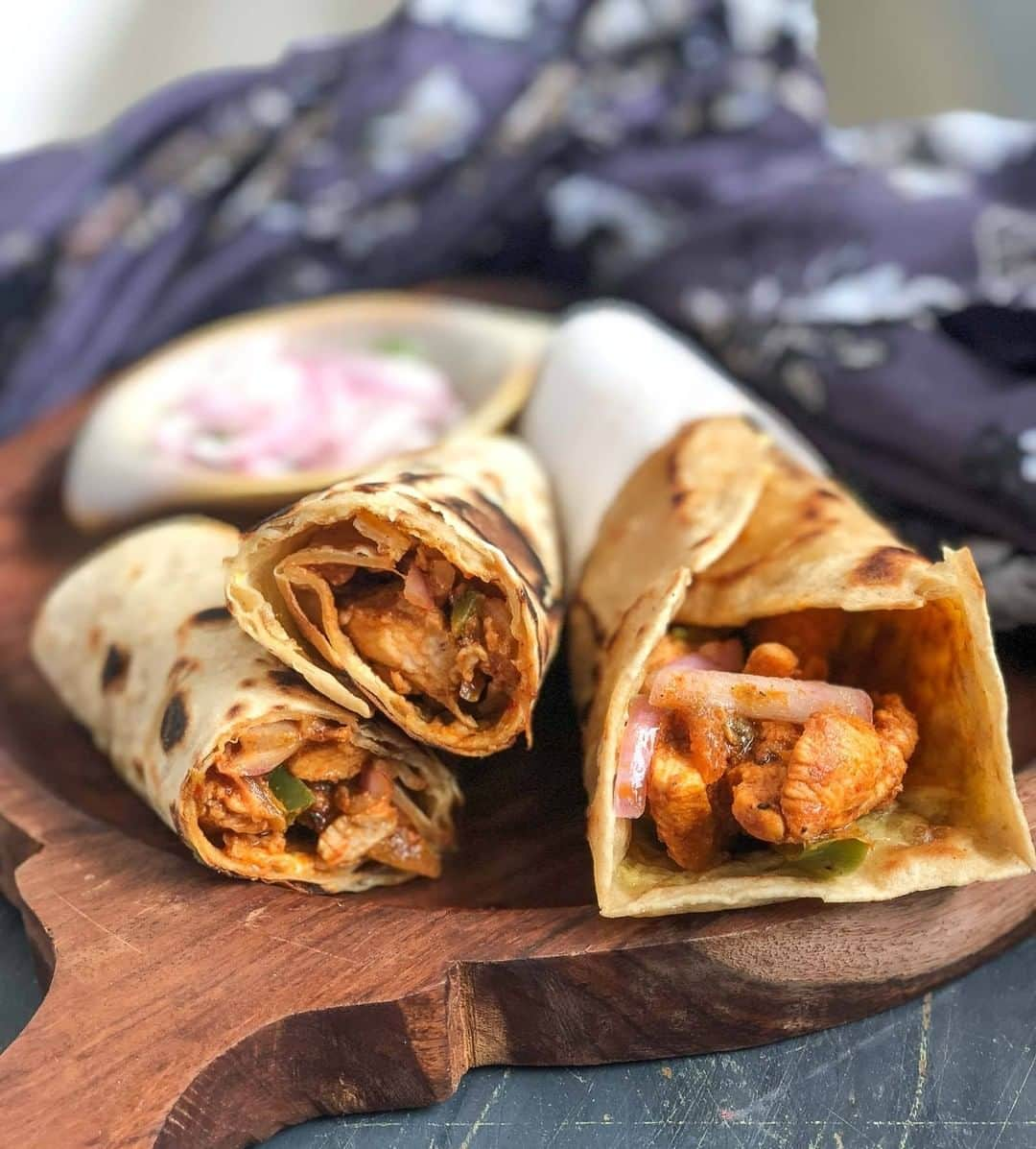 Archana's Kitchenさんのインスタグラム写真 - (Archana's KitchenInstagram)「This Chicken Kathi Roll Recipe is a lip-smacking roll of a flaky Tawa paratha stuffed with a flavourful chicken filling. Once your parathas are ready this dish can be put together real quick. Serve it as a high tea or as an evening snack or even as dinner. Get the recipe from the smart.bio link in my profile @archanaskitchen . . . . . . . . #recipes #easyrecipes #snacks #teatime #teatimesnacks #archanaskitchen #fritters #tikki #alootikki #winterrecipes #cutlet #mushroom #mushroomrecipes #cutletrecipes #healthyeating #eatfit #cooking #food #healthyrecipes #foodphotography #recipeoftheday #comfortfood #deliciousfood #monsoonsnacks」12月19日 20時30分 - archanaskitchen