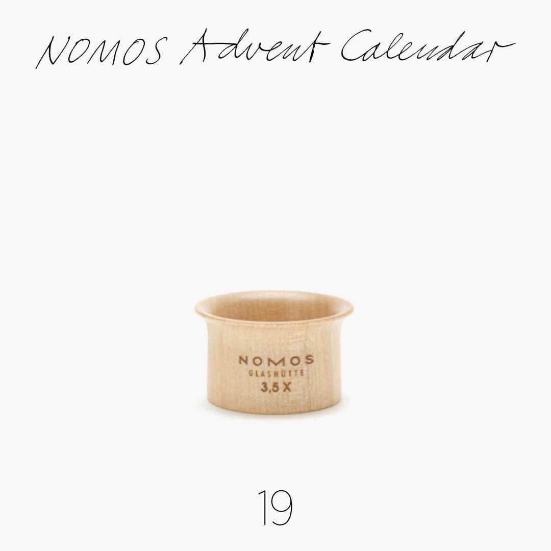 のインスタグラム：「You won’t look at your NOMOS timepiece the same way again if you win today’s gift—we promise. Can’t wait to see more? Open door number 19 via the link in our bio.  #nomosglashuette #nomosgiftguide #nomosadventcalendar #happyholidays」