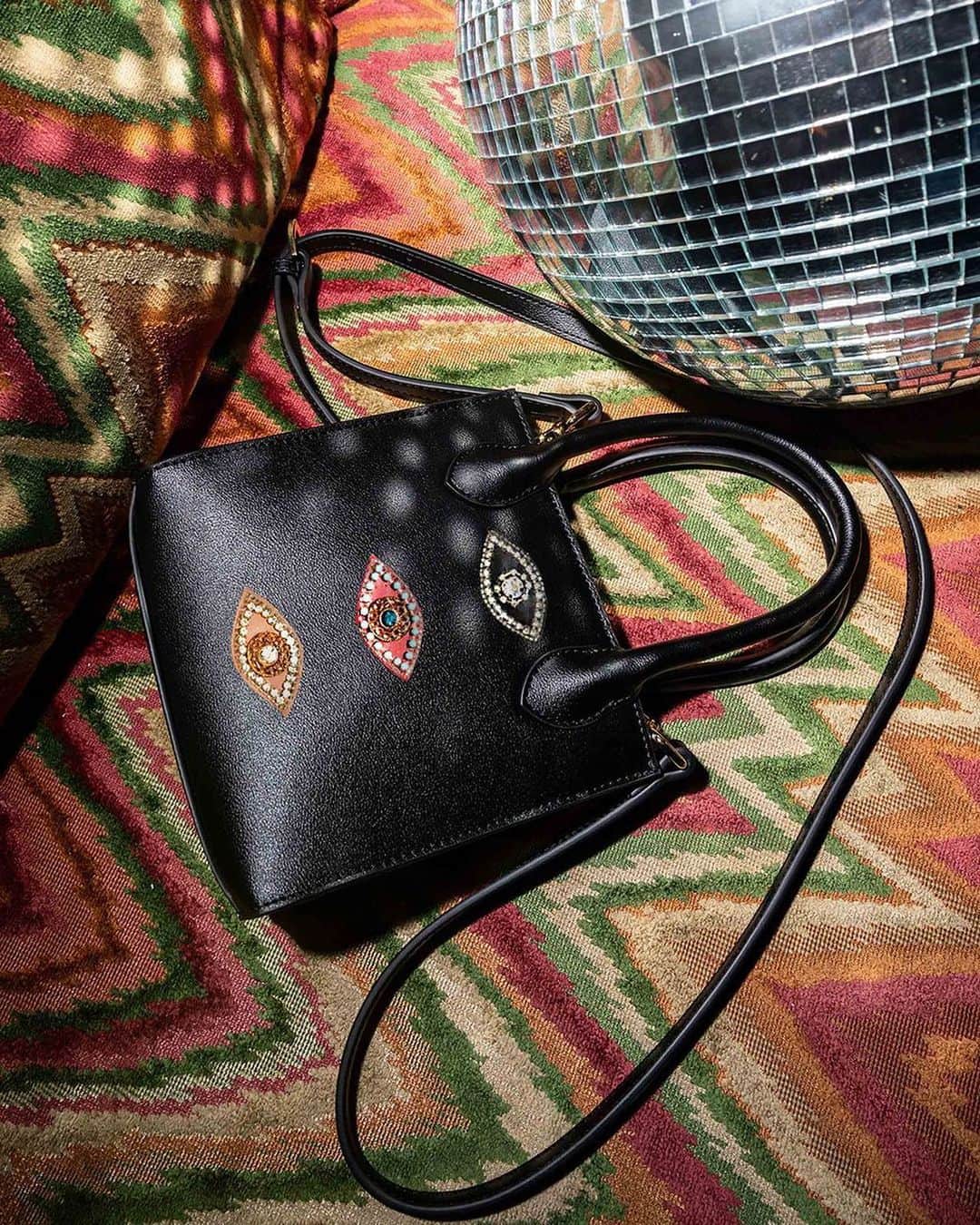 ニコールミラーのインスタグラム：「Essentials only in our Evil Eye Niki Mini Bag. 👜 It’s also the perfect gift- check our stories to find out what else the NM staff is #gifting this holiday season! #NMStyle」