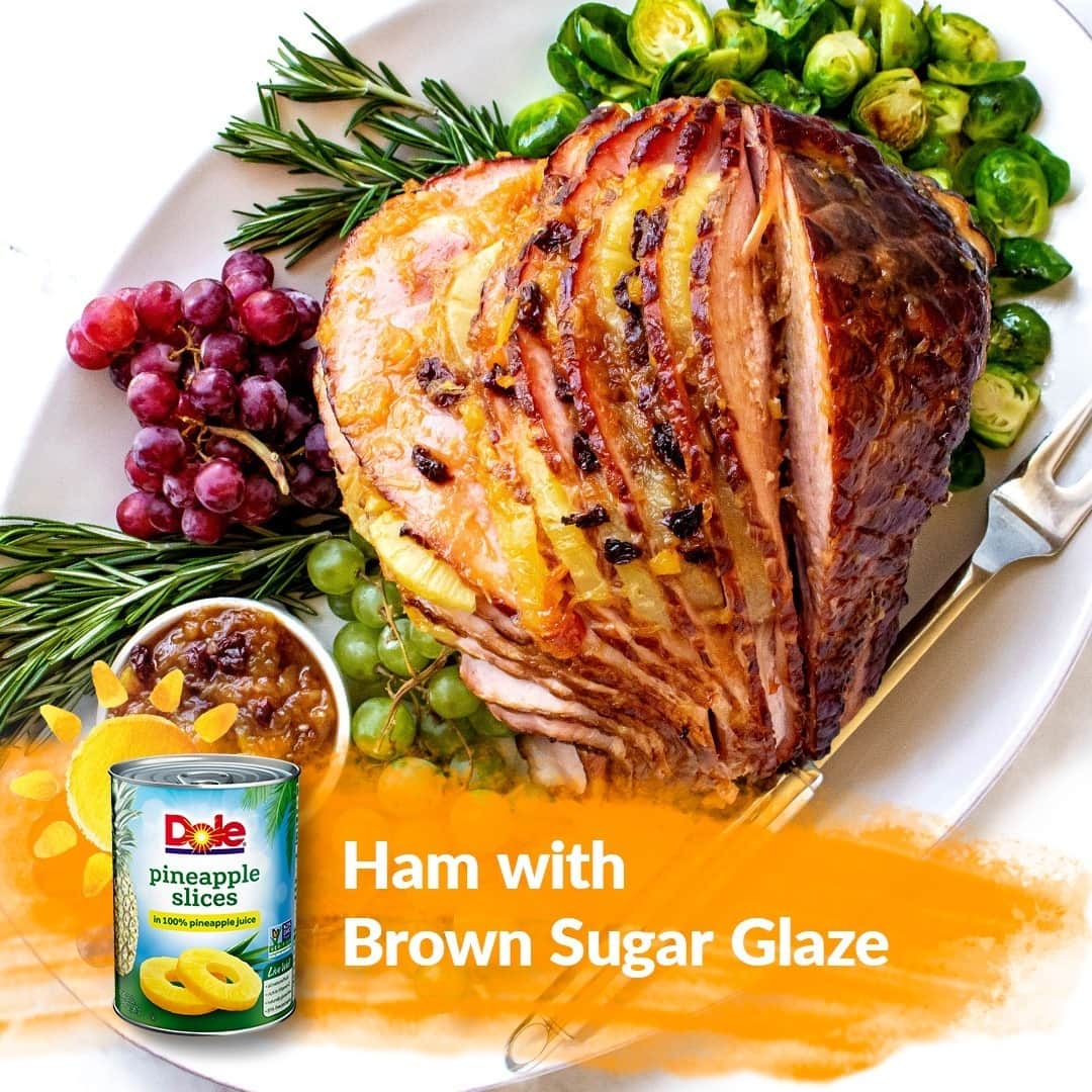 Dole Packaged Foods（ドール）のインスタグラム：「Make your holiday meal a showstopper when you serve this picture-perfect Ham with Brown Sugar Glaze!   INGREDIENTS: 1 can (20 oz.) DOLE® Crushed Pineapple in 100% Pineapple Juice  1/4 cup packed brown sugar 1/2 cup apricot jam or preserves 1/2 cup dried cherries chopped 1 tablespoon cornstarch 1 teaspoon ground cinnamon 1 can (20 oz.) DOLE Pineapple Slices in 100% Pineapple Juice, drained 1 (5-1/2 pound) spiral ham  DIRECTIONS: 1) Stir together undrained crushed pineapple, sugar, jelly, cherries, and cinnamon in medium saucepan. Heat, stirring about 5 minutes or until sauce slightly thickens.  2) Cut pineapple slices in half. Put 2 pineapple halves next to each other between each ham slice. Place the ham in rimmed baking sheet or shallow roasting pan. Add 3/4 cup water to the pan. Brush 1/2 cup glaze onto all sides and into ham slices.  3) Bake at 350°F. for 30 minutes or until heated through. Serve remaining glaze with ham.」