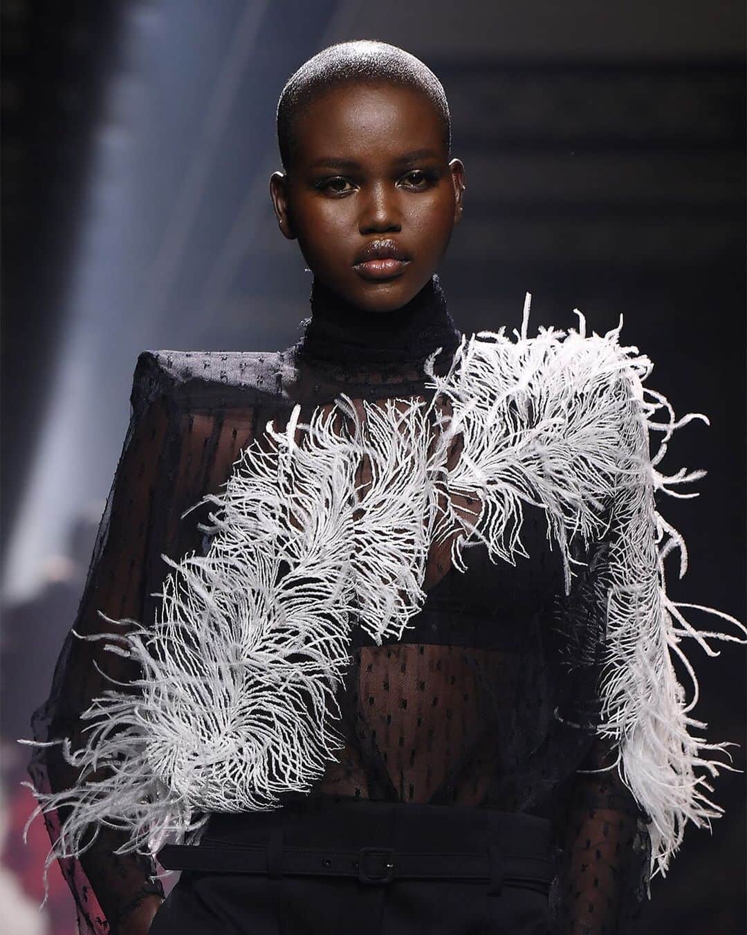 Fashion Weekのインスタグラム：「Light as a feather at @givenchyofficial’s winter 2021 collection with model @adutakech. Photo by @gettyimages.」