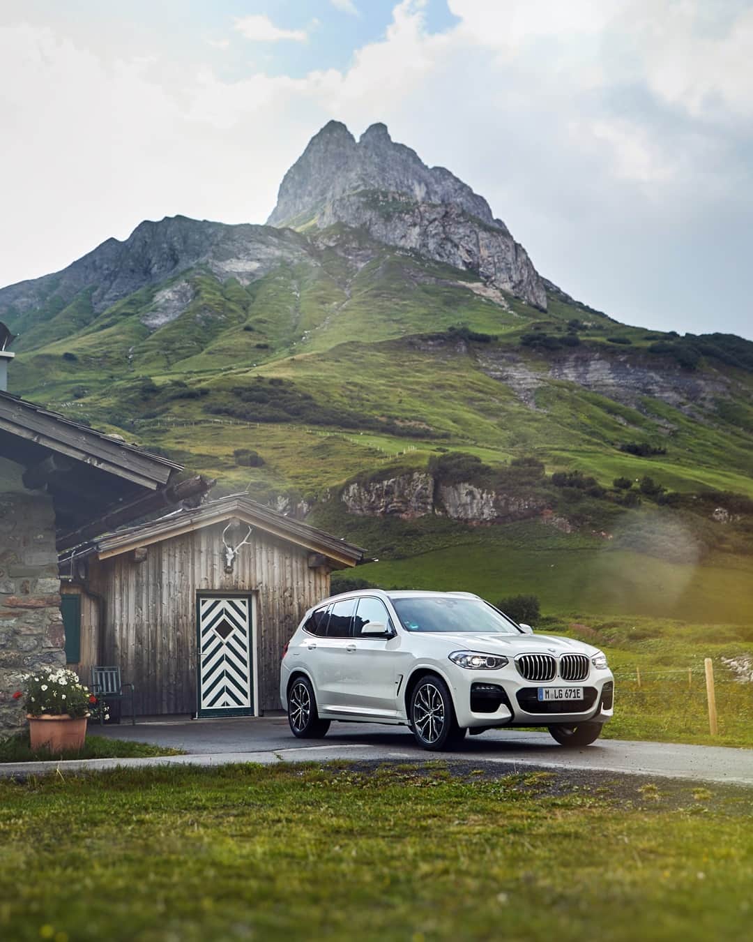 BMWのインスタグラム：「The mountains are calling. What's your answer? The BMW X3. #TheX3 #BMW #X3 __ BMW X3 xDrive30e: Energy consumption in kWh/100 km (combined): 17.2. Fuel consumption in l/100 km (combined): 2.4–2.1. CO2 emissions in g/km (combined): 54–49. Further information: www.bmw.com/disclaimer.」
