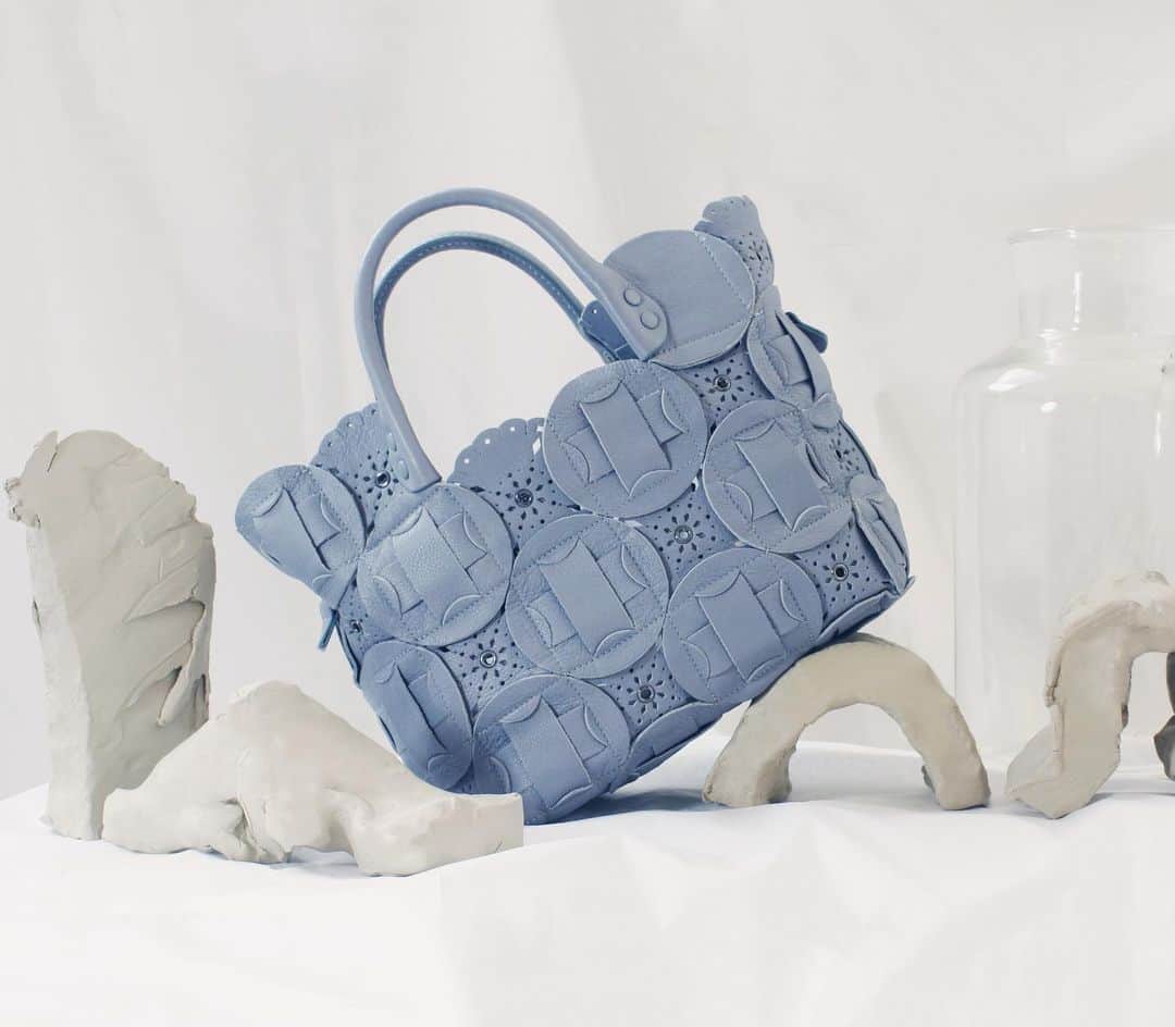 ジャマンピュエッシュのインスタグラム：「An updated version of one of Jamin Puech's classics, the Rosalinda PM this season highlights an intricate mix of open-work leather flowers and hand-cut leather bands.」
