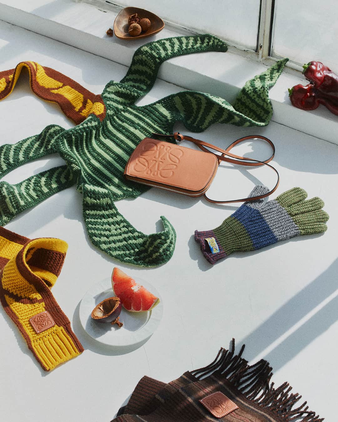 のインスタグラム：「Accessories designed for cooler weather - from scarves to socks, hats and gloves - come handcrafted in mohair, wool, silk and cashmere.  loewe.com  #LOEWE #LOEWEgifts」