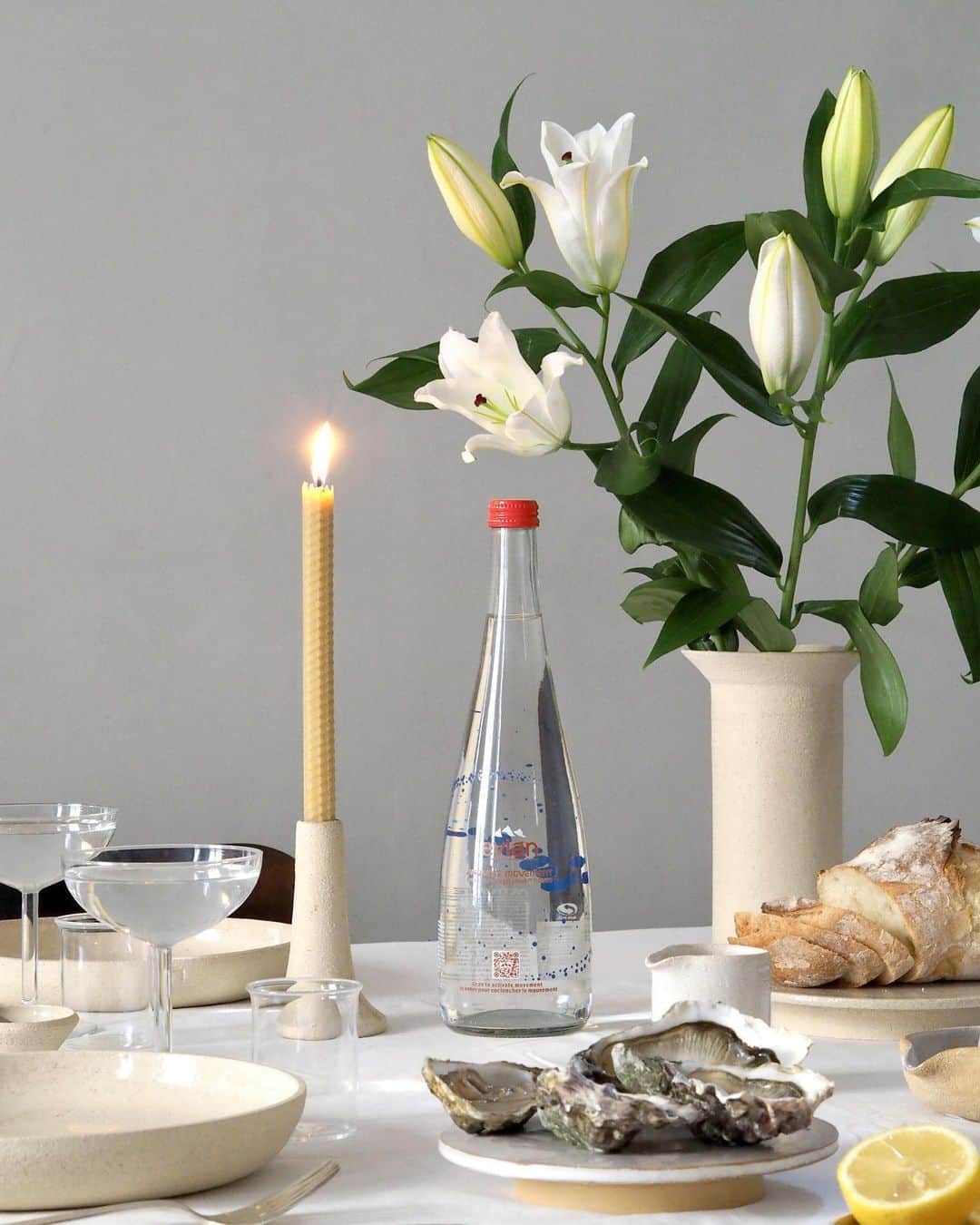 evianのインスタグラム：「As part of our series #eviantable, @studioracines shares with us a dreamy dinner set up. There’s no better way to end this year then by being with those you love.  How are you spending the holidays? Share your tablescape with #eviantable for your chance to be featured.  Discover more of these beautiful ceramics @studioracines」