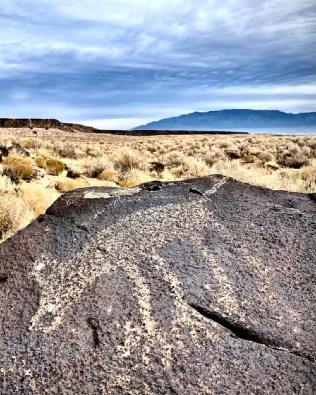 アメリカ内務省さんのインスタグラム写真 - (アメリカ内務省Instagram)「Petroglyph National Monument in #NewMexico protects one of the largest petroglyph sites in North America, featuring designs and symbols carved onto #volcanic rocks by Native Americans and Spanish settlers 400 to 700 years ago. These images are a valuable record of cultural expression and hold profound spiritual significance for contemporary #NativeAmericans and for the descendants of the early Spanish settlers. It is estimated 90% of the monument's petroglyphs were created by the ancestors of today's Pueblo people. Visitors have chance to observe hundreds of petroglyphs along three hiking trails in a stunning outdoor art gallery. Photo @petroglyphnps by Daniel Leifheit, National Park Service. #usinterior #FindYourPark」12月17日 0時20分 - usinterior